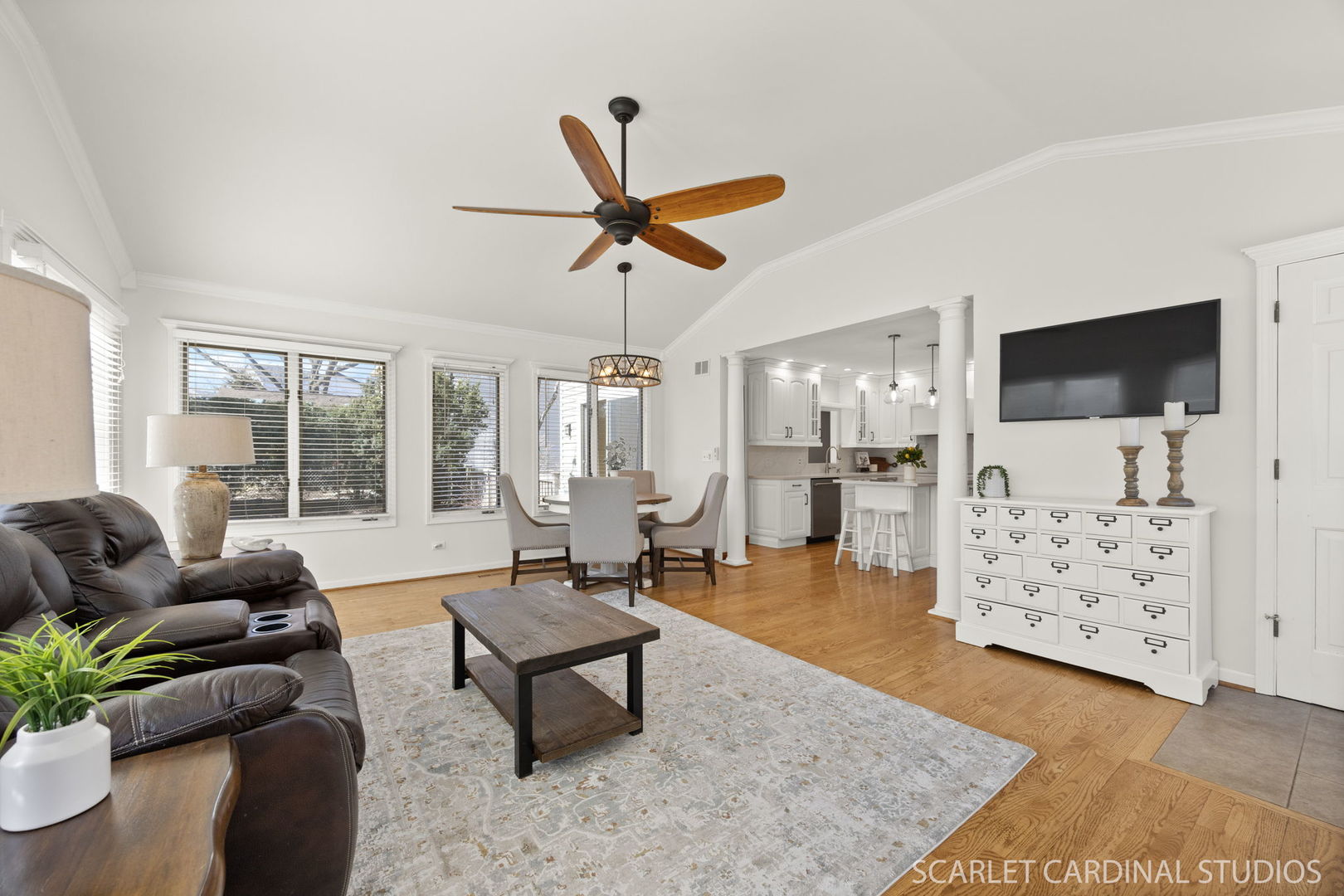 26W275 Tomahawk Drive Wheaton, IL 60189 - Photo 10 of 41 a living room with furniture and a flat screen tv