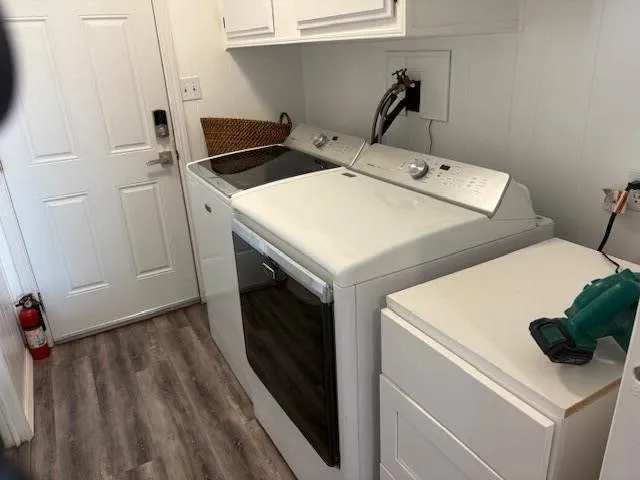 a utility room with dryer and washer