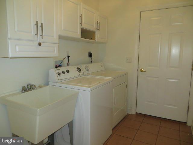 28 Wood Chip Road Elkton, MD 21921 - Photo 13 of 26 LAUNDRY ROOM HAS CERAMIC FLOOR, TUB AND CABINETS