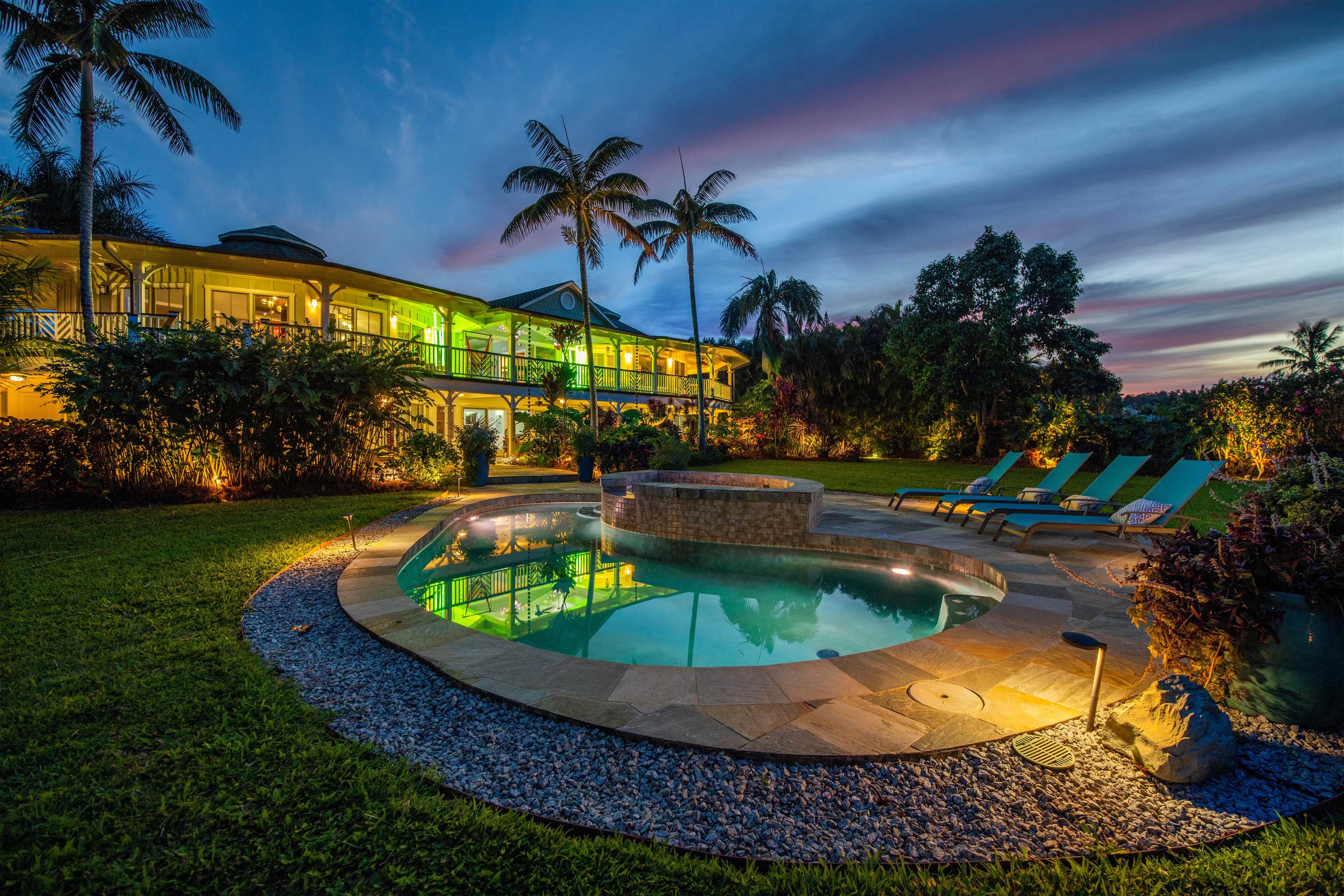 a view of a swimming pools under an umbrella