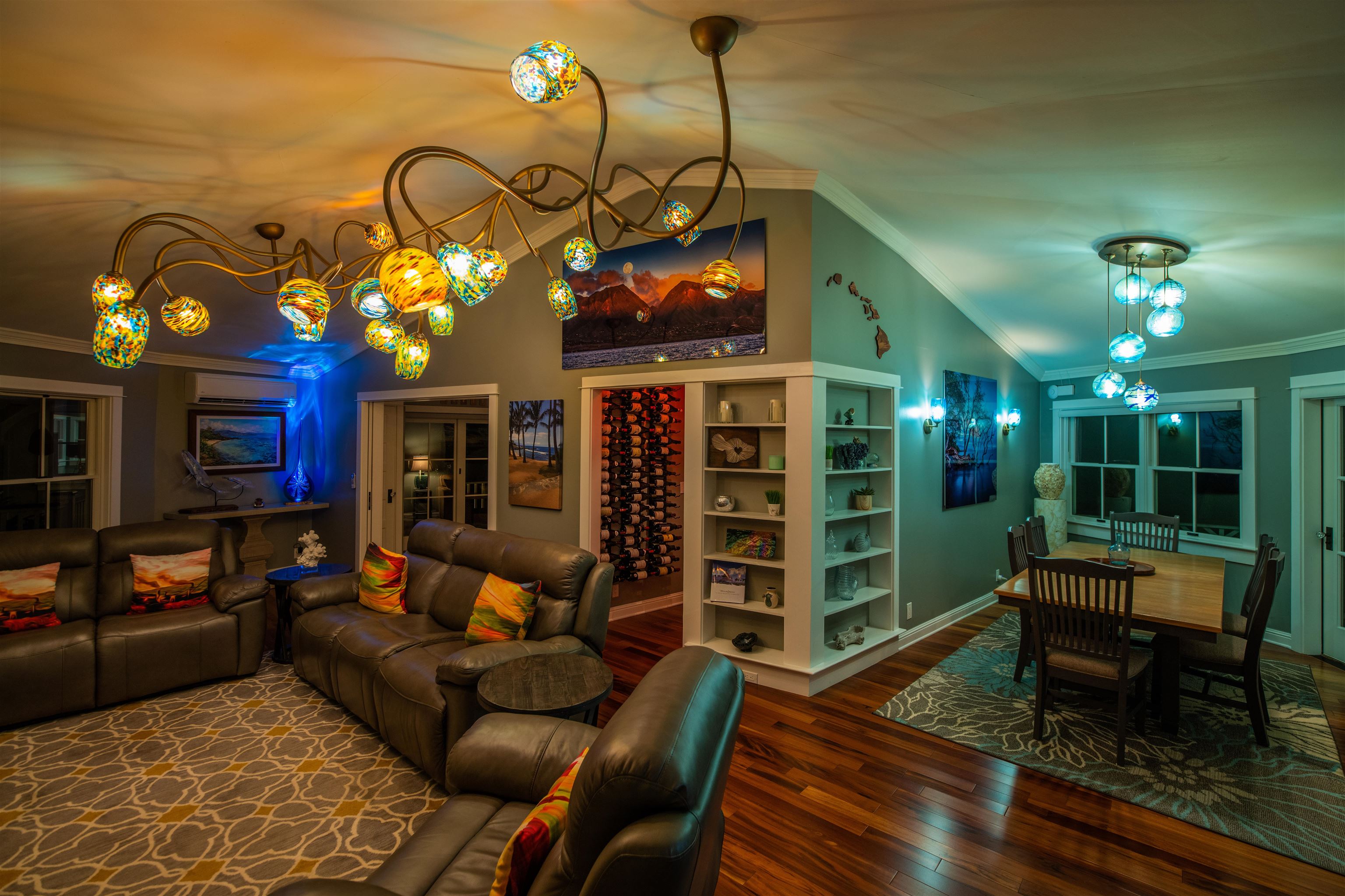 65 North Holokai Road Haiku, HI 96708 - Photo 16 of 50 a living room with furniture a lamp and a fireplace