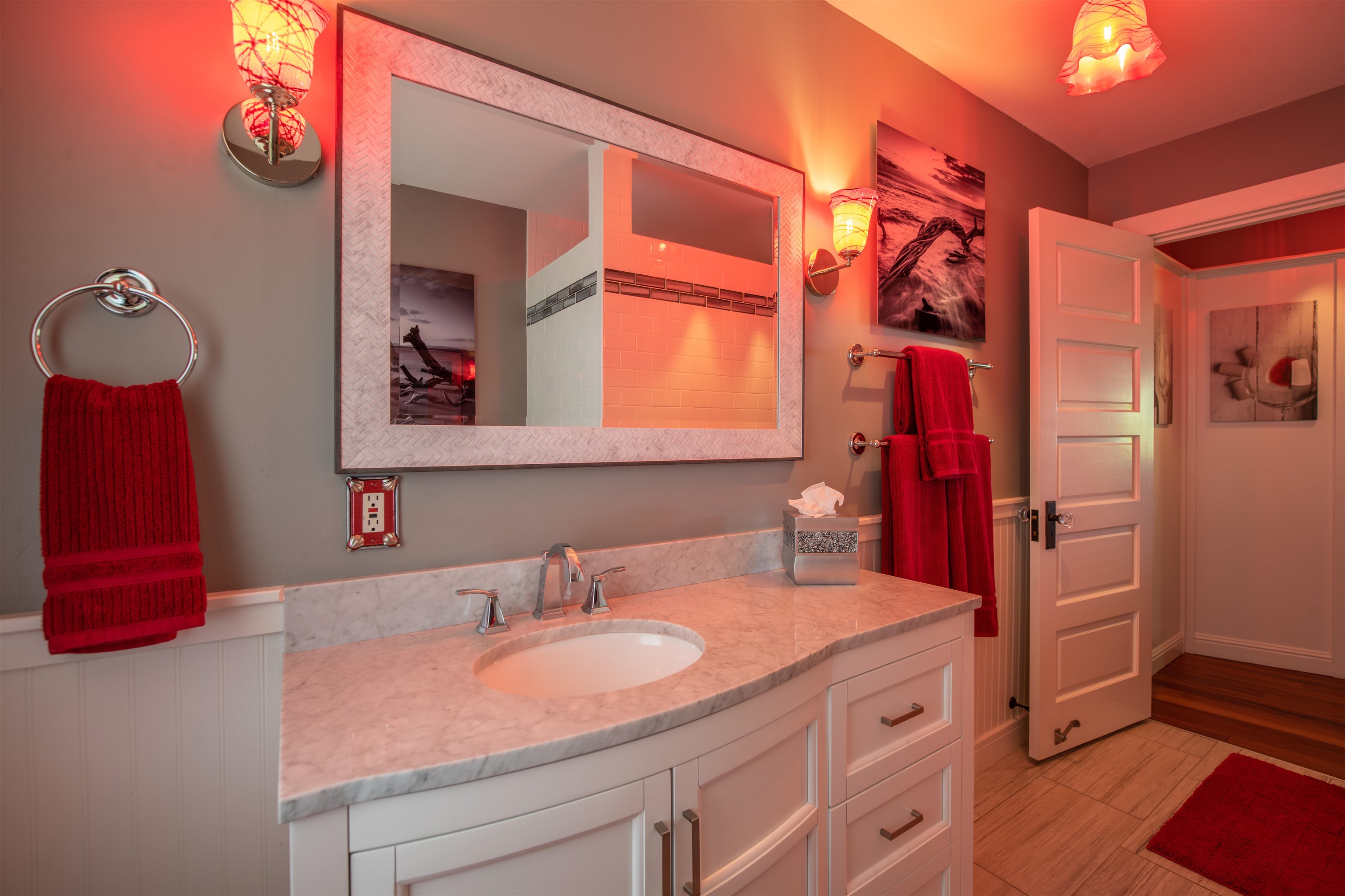65 North Holokai Road Haiku, HI 96708 - Photo 17 of 50 a bathroom with a granite countertop sink and a mirror