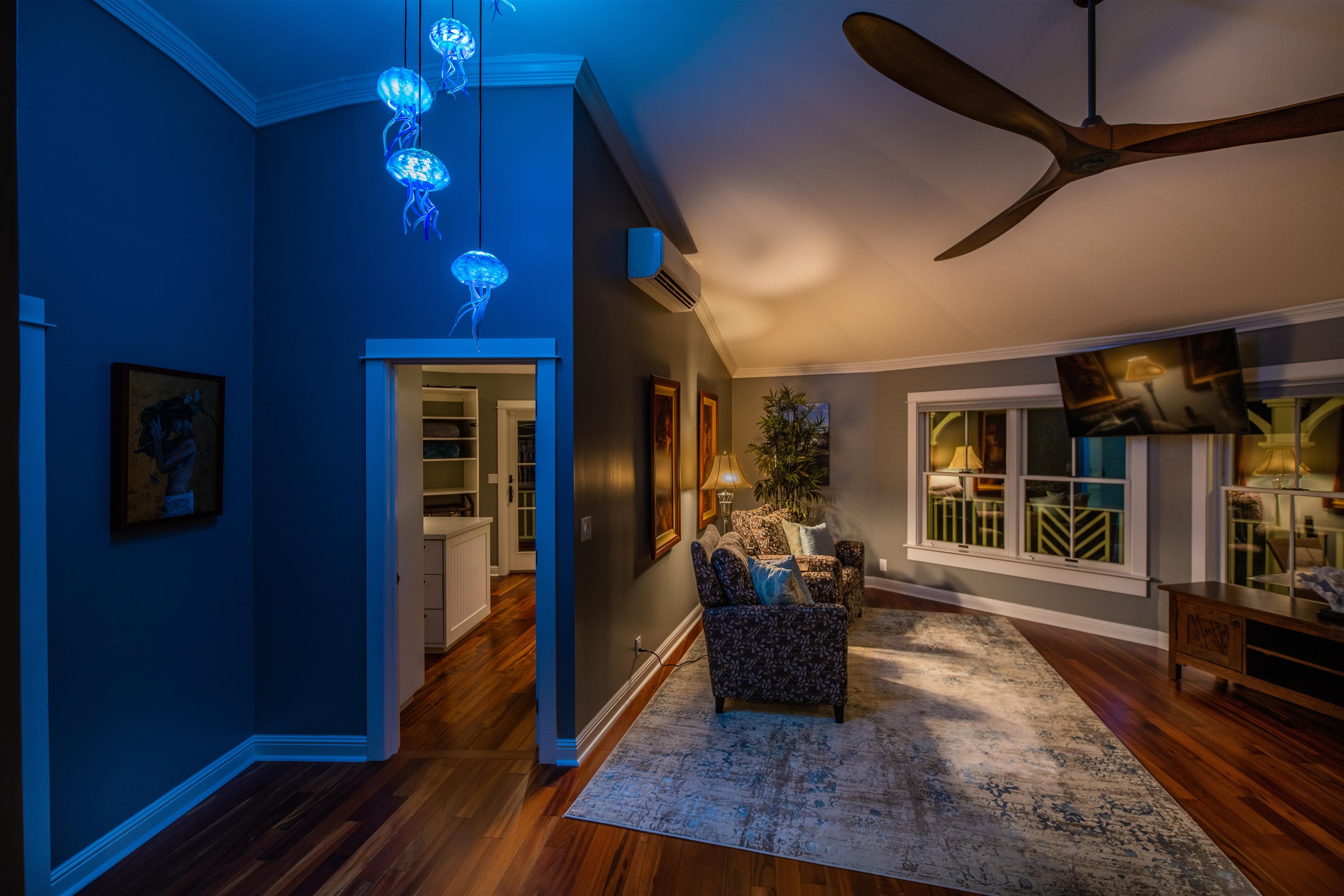 65 North Holokai Road Haiku, HI 96708 - Photo 18 of 50 a living room with furniture and wooden floor