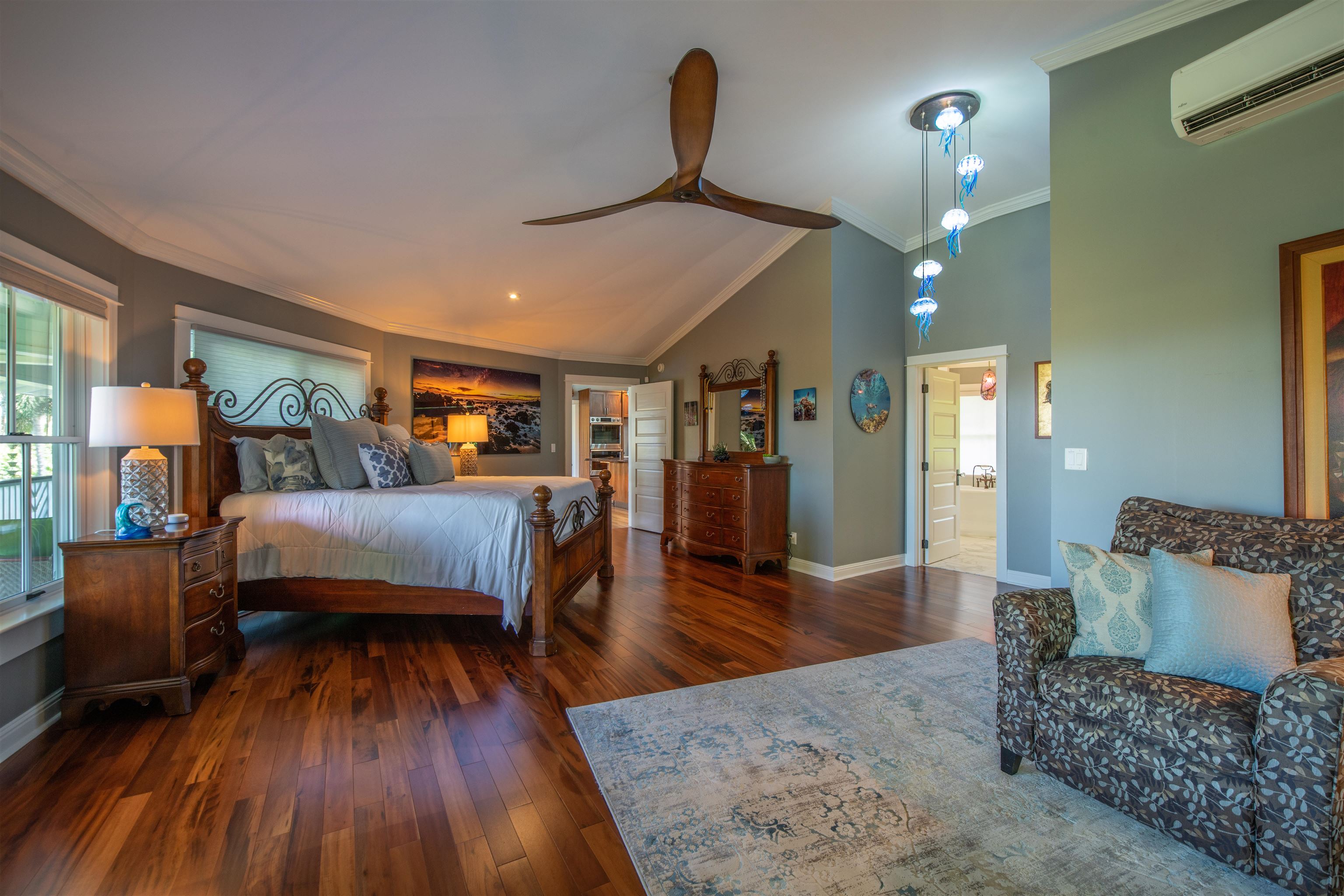 65 North Holokai Road Haiku, HI 96708 - Photo 19 of 50 a living room with furniture and wooden floor