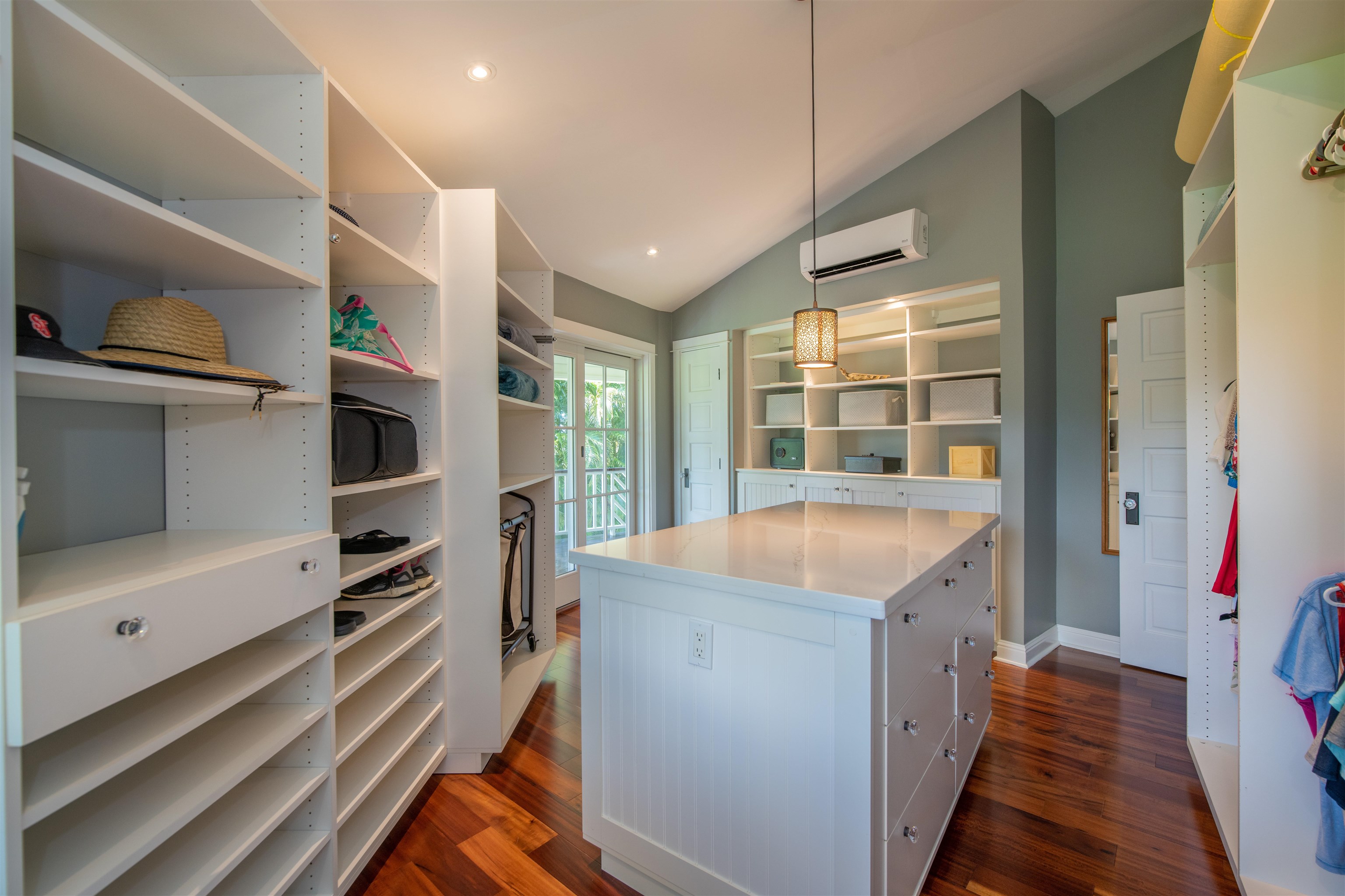 65 North Holokai Road Haiku, HI 96708 - Photo 22 of 50 a kitchen with a refrigerator and a sink