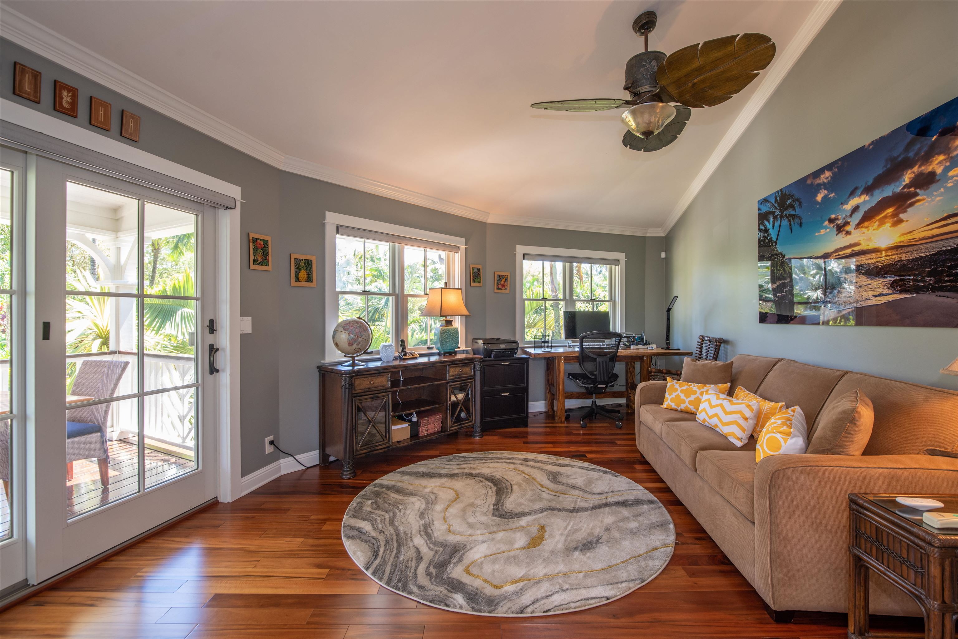 65 North Holokai Road Haiku, HI 96708 - Photo 27 of 50 a living room with furniture and a large window