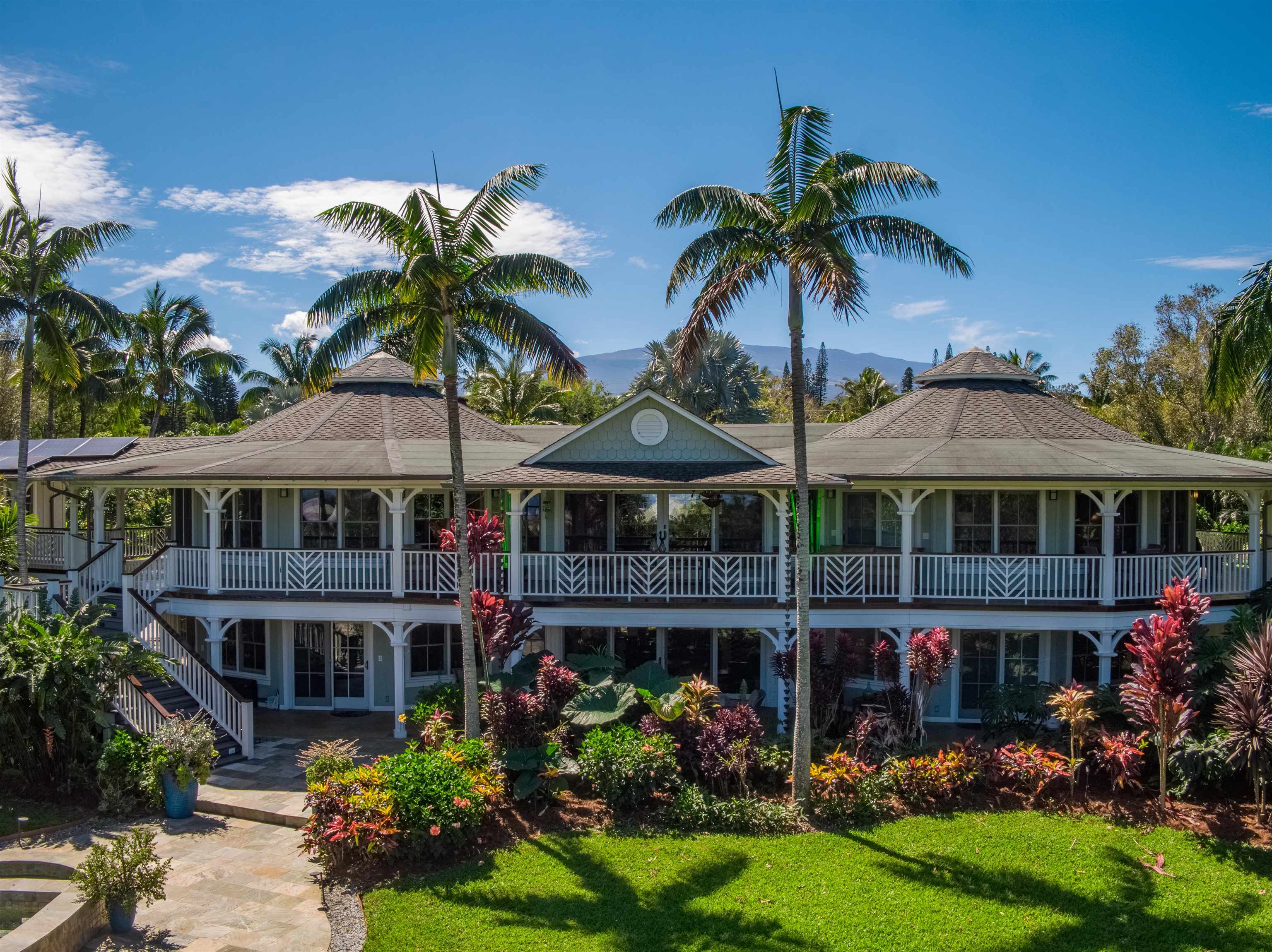 65 North Holokai Road Haiku, HI 96708 - Photo 3 of 50 front view of a house with a garden