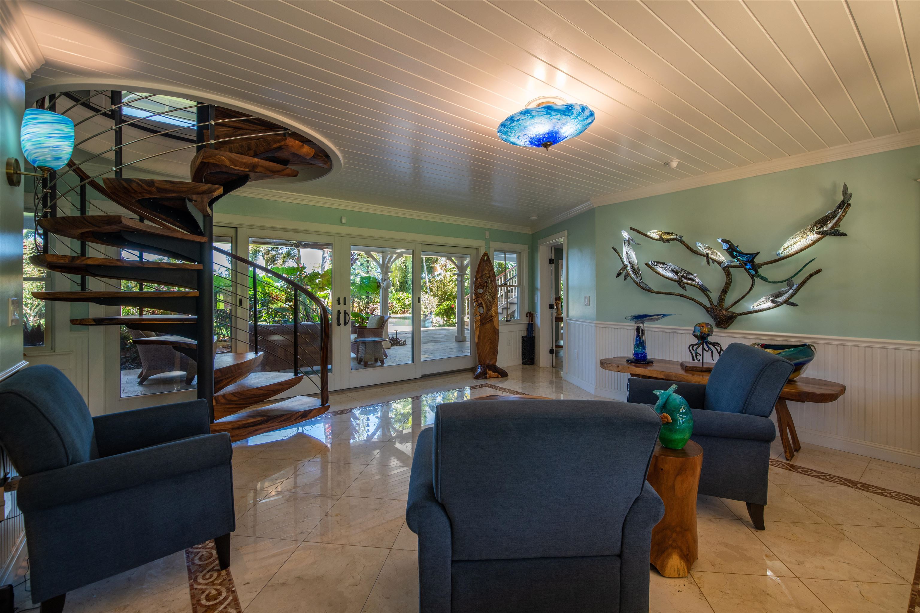 65 North Holokai Road Haiku, HI 96708 - Photo 32 of 50 a living room with furniture and a large window