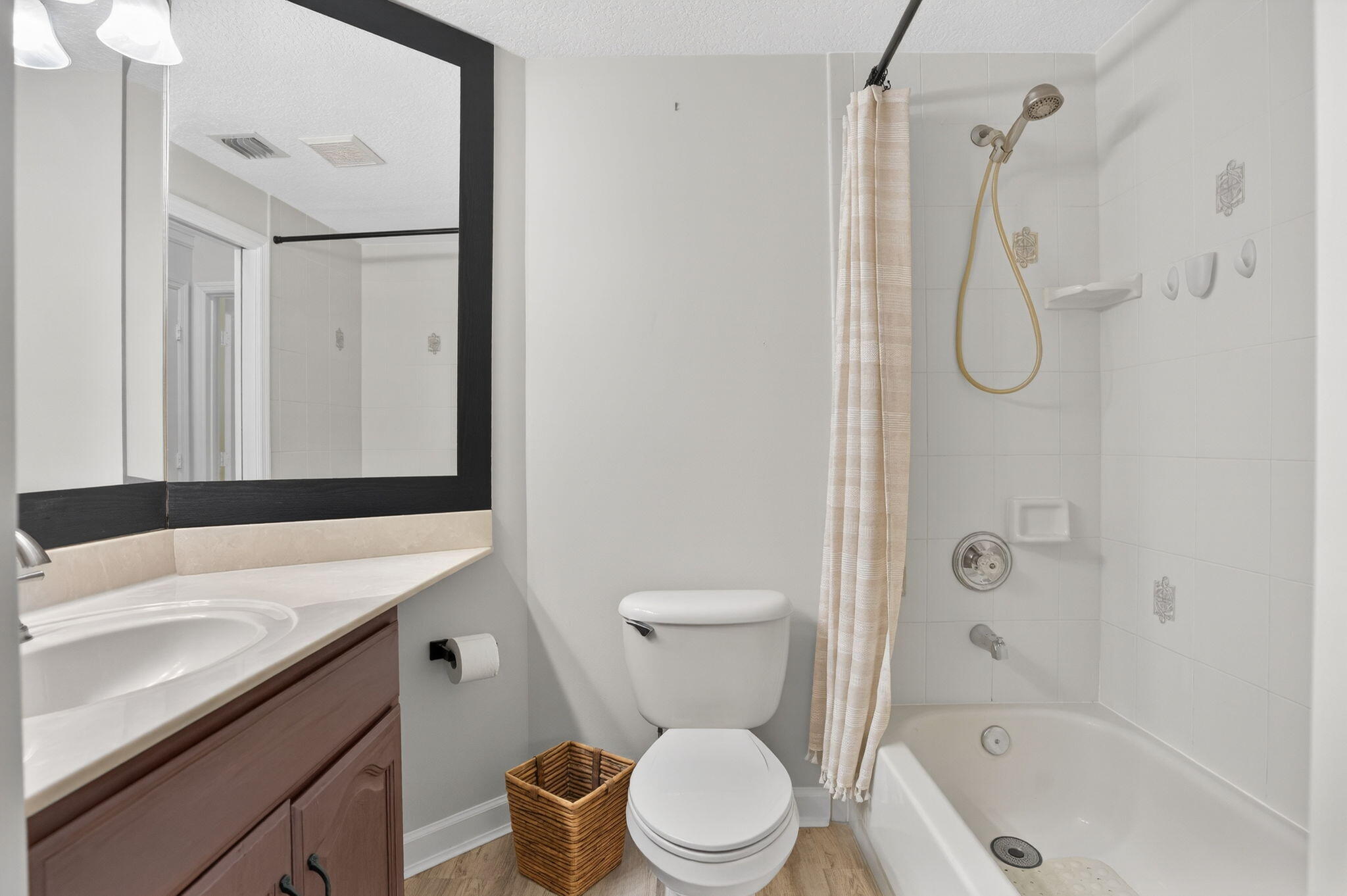 9275 Southeast Mercury Street Hobe Sound, FL 33455 - Photo 32 of 65 a bathroom with a granite countertop toilet sink and shower