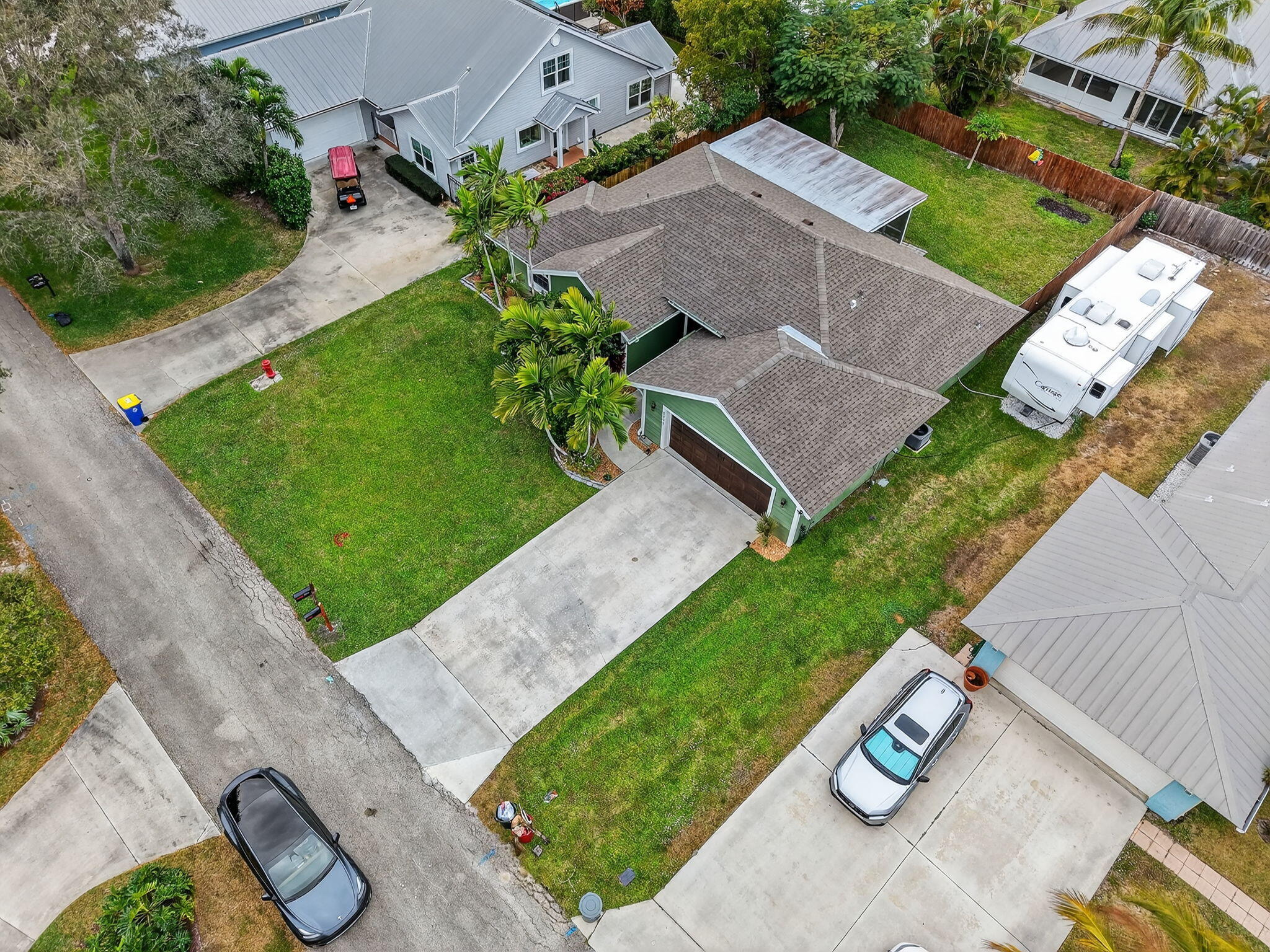 9275 Southeast Mercury Street Hobe Sound, FL 33455 - Photo 49 of 65 an aerial view of a house