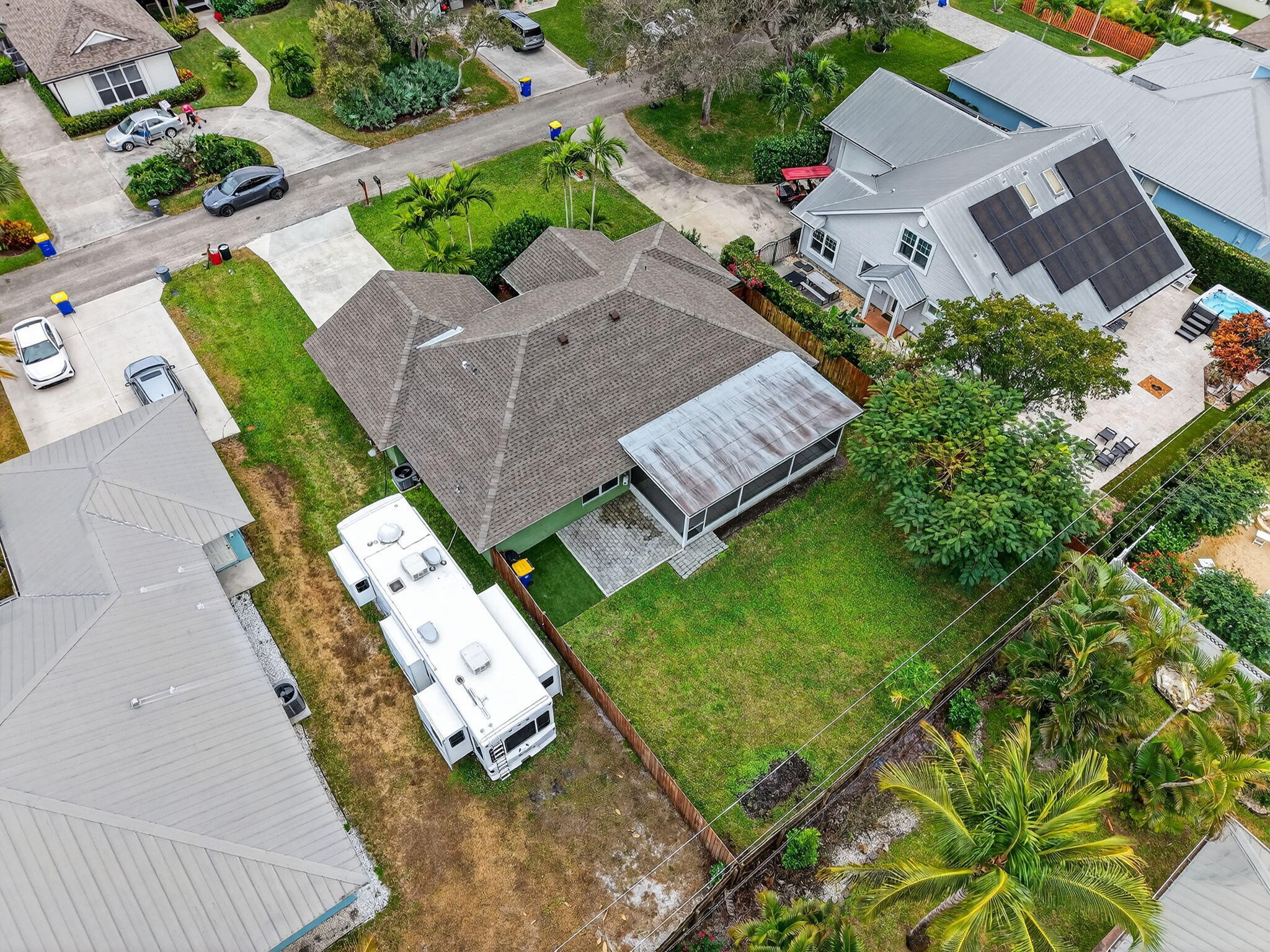 9275 Southeast Mercury Street Hobe Sound, FL 33455 - Photo 51 of 65 an aerial view of a house