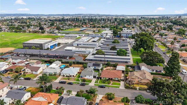 an aerial view of a city with lots of residential buildings