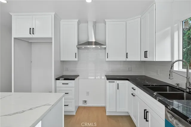 an aerial view of a city with lots of residential buildings