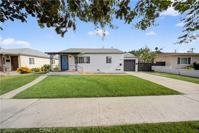 a house view with a garden space