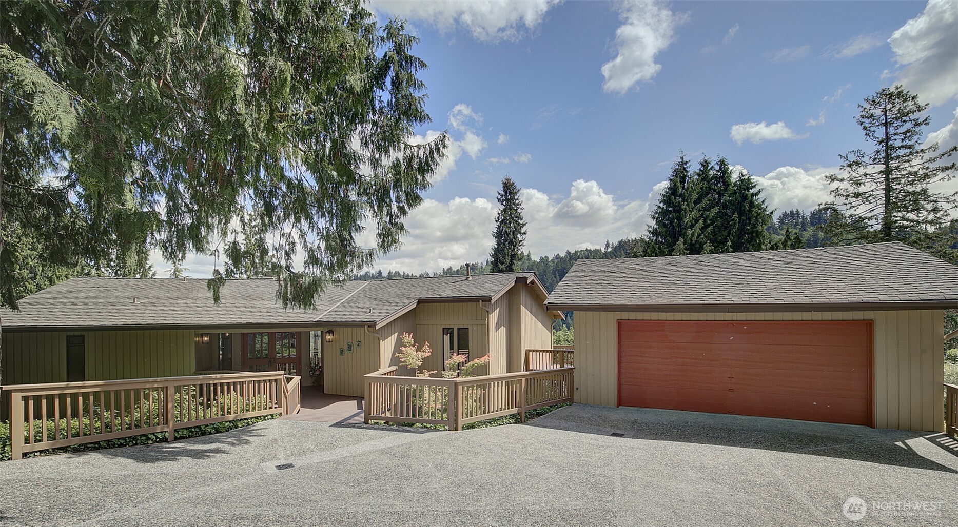 an outdoor view of house with garage