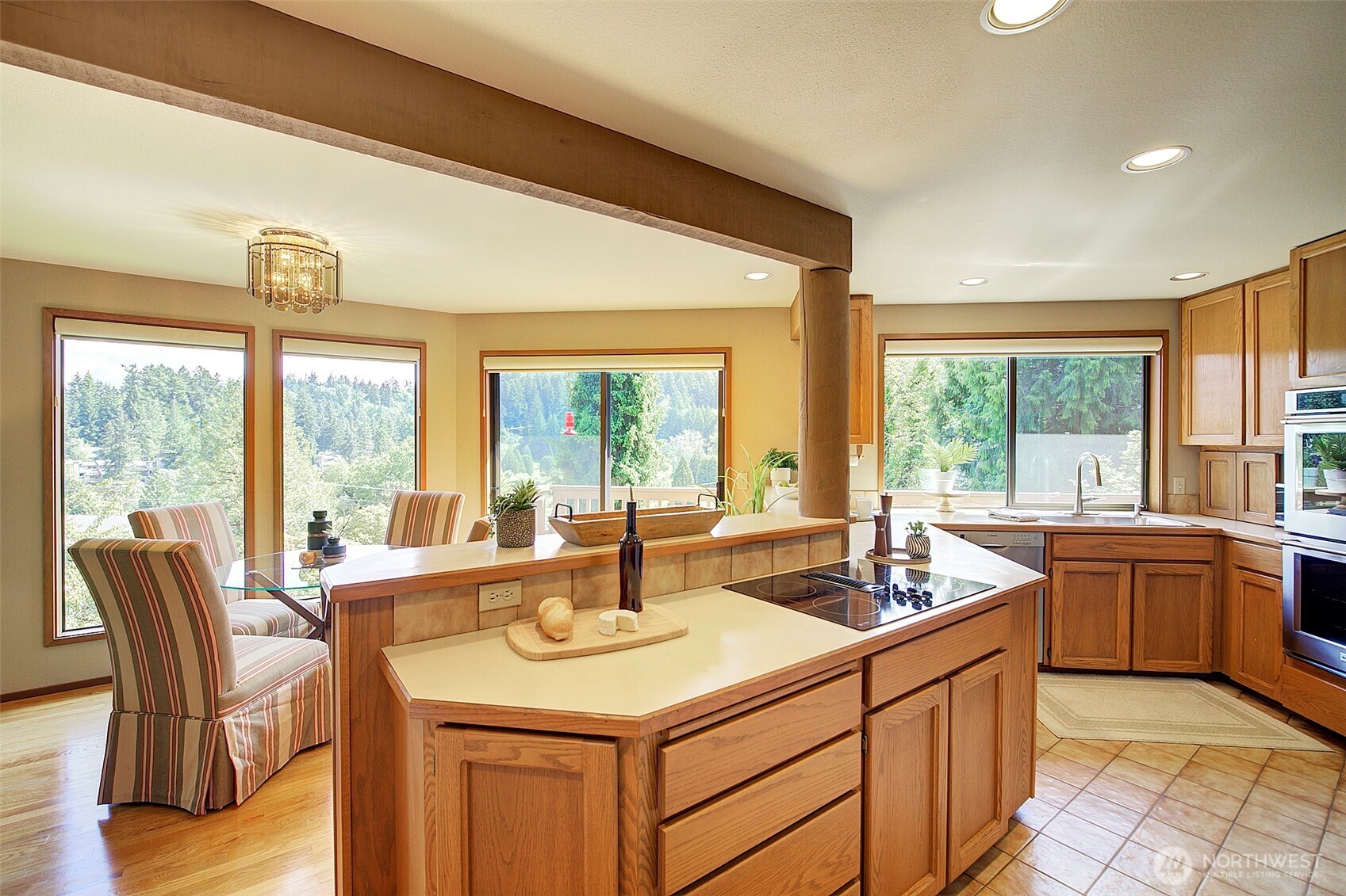 9430 Hoeder Lane Bothell, WA 98011 - Photo 11 of 39 a kitchen with granite countertop a sink and a stove