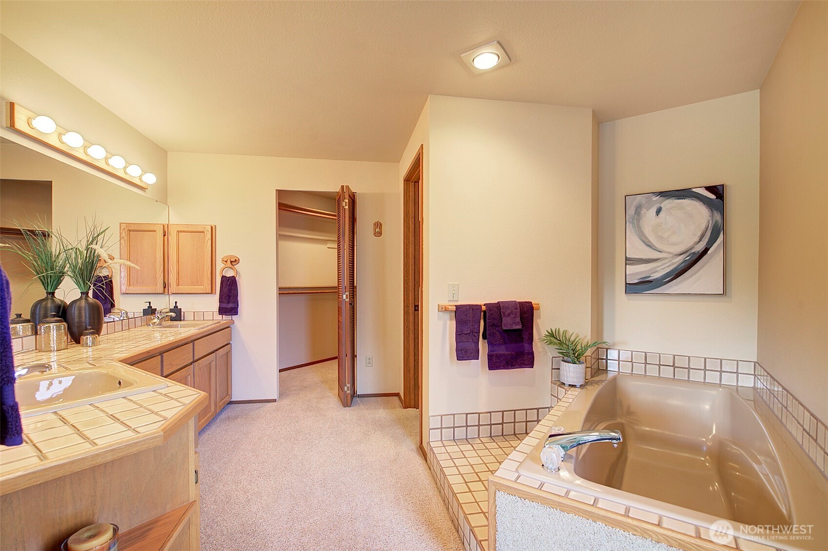 9430 Hoeder Lane Bothell, WA 98011 - Photo 16 of 39 a kitchen with a sink a stove and a refrigerator