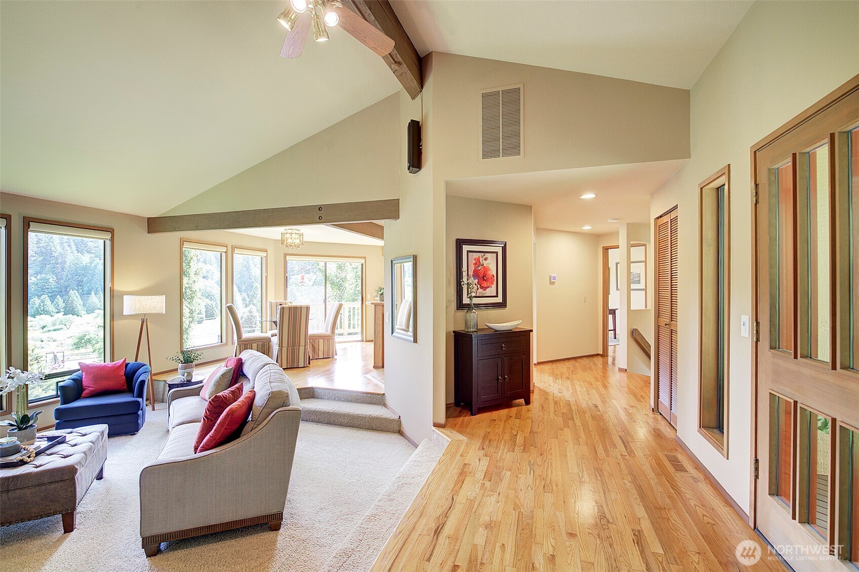 9430 Hoeder Lane Bothell, WA 98011 - Photo 23 of 39 a living room with furniture and a gate