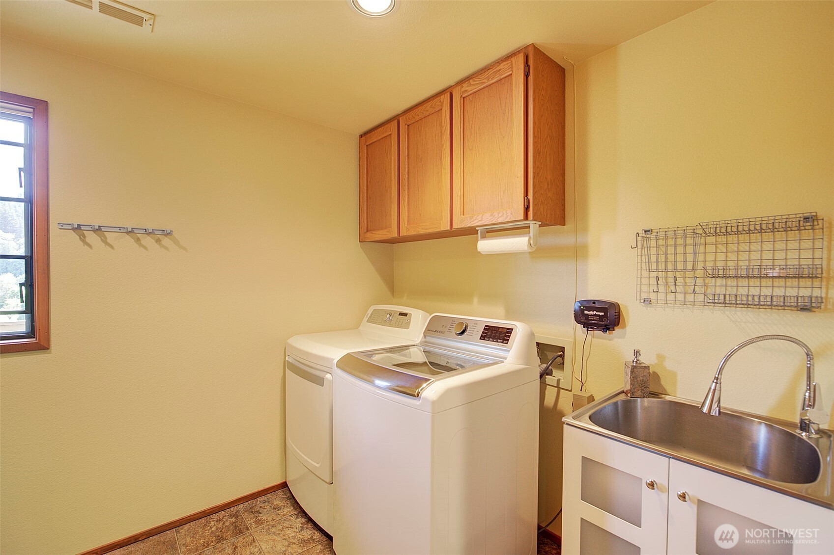 9430 Hoeder Lane Bothell, WA 98011 - Photo 30 of 39 a room with storage and utility