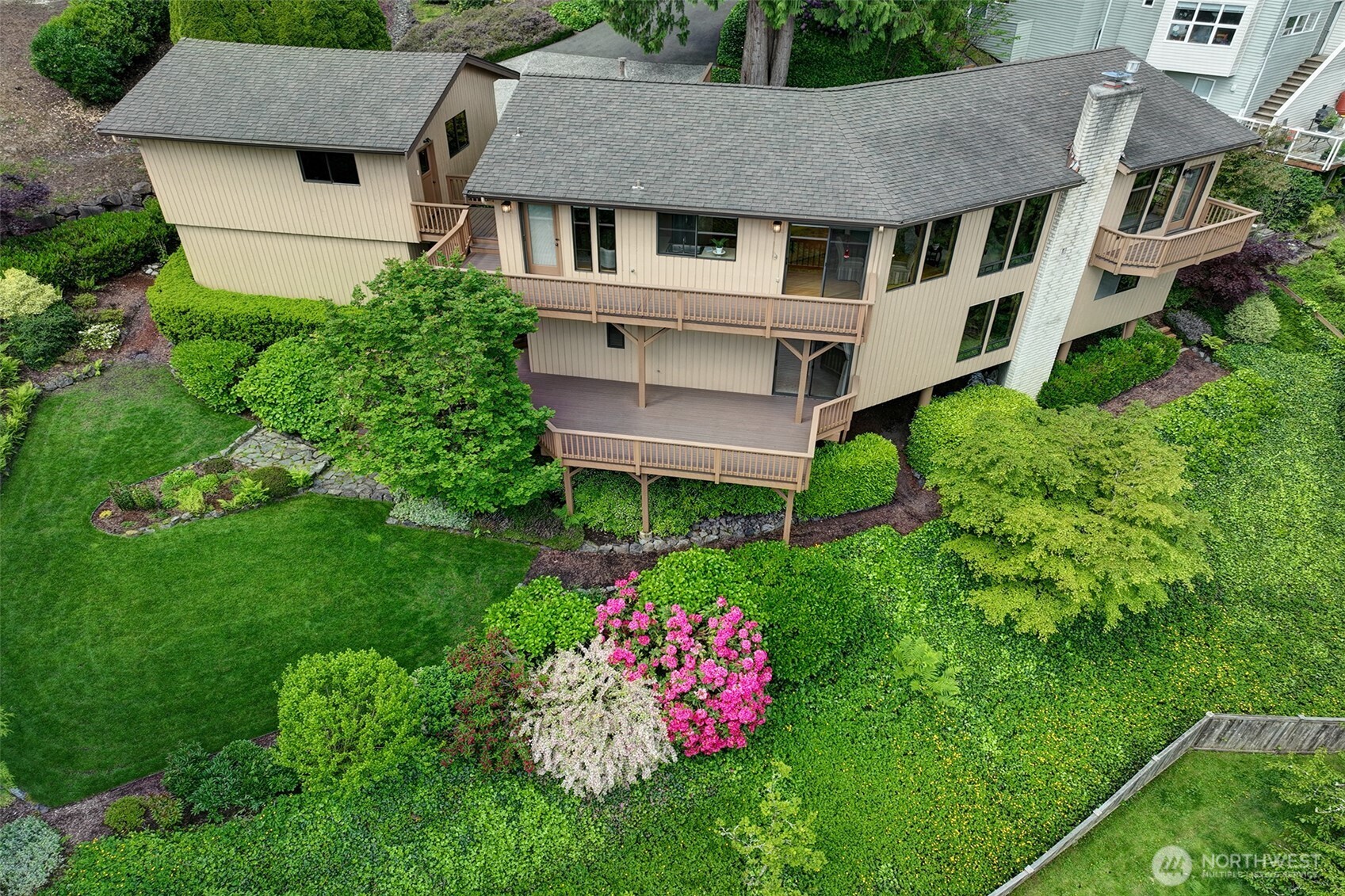 9430 Hoeder Lane Bothell, WA 98011 - Photo 3 of 39 a aerial view of a house with table and chairs and a table