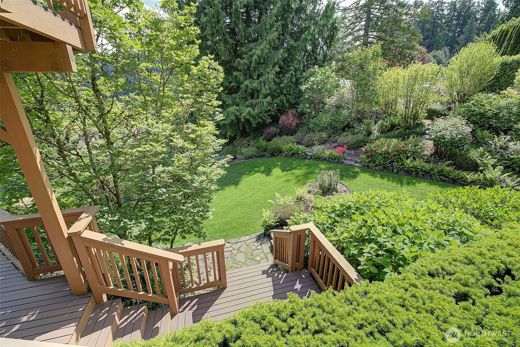 9430 Hoeder Lane Bothell, WA 98011 - Photo 34 of 39 a view of backyard with deck and garden