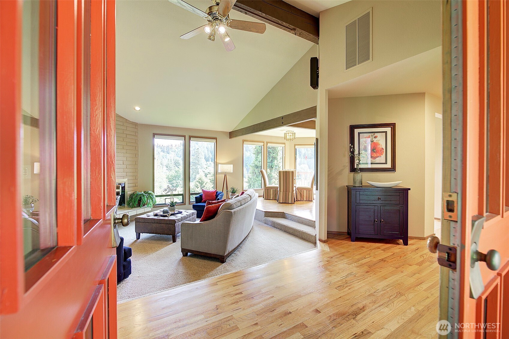 9430 Hoeder Lane Bothell, WA 98011 - Photo 5 of 39 a living room with furniture and a large window