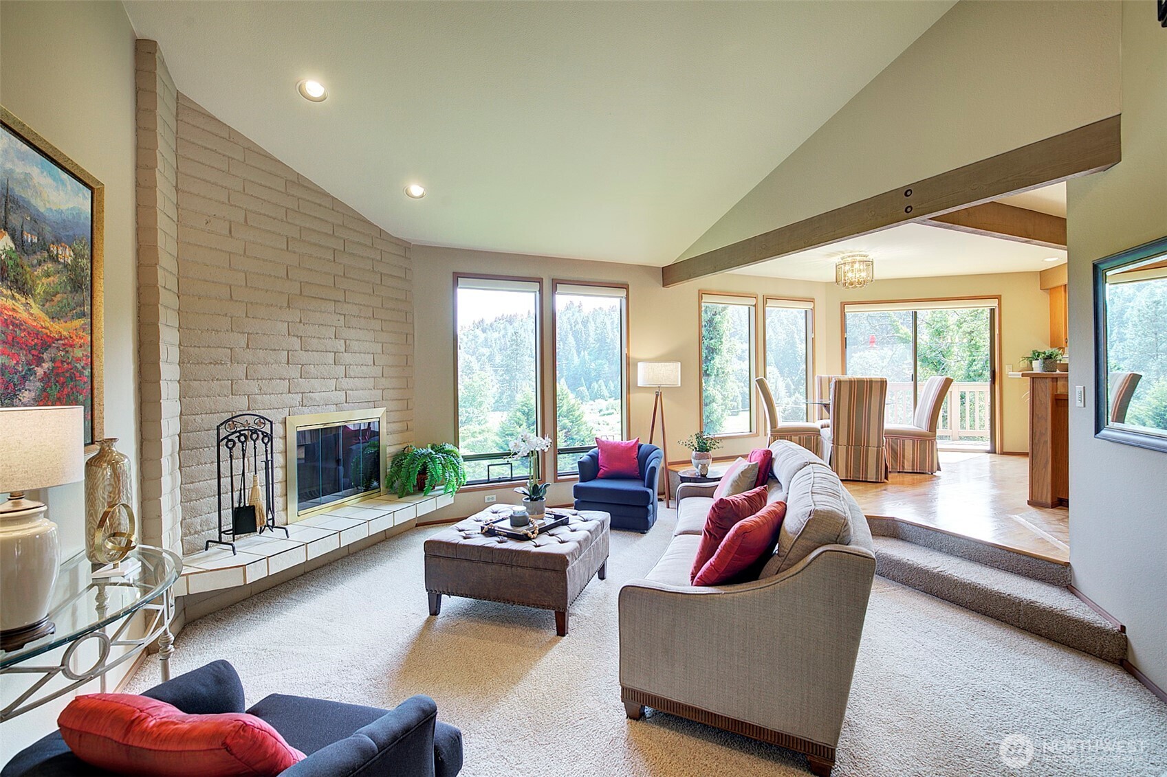9430 Hoeder Lane Bothell, WA 98011 - Photo 6 of 39 a living room with furniture and a fireplace