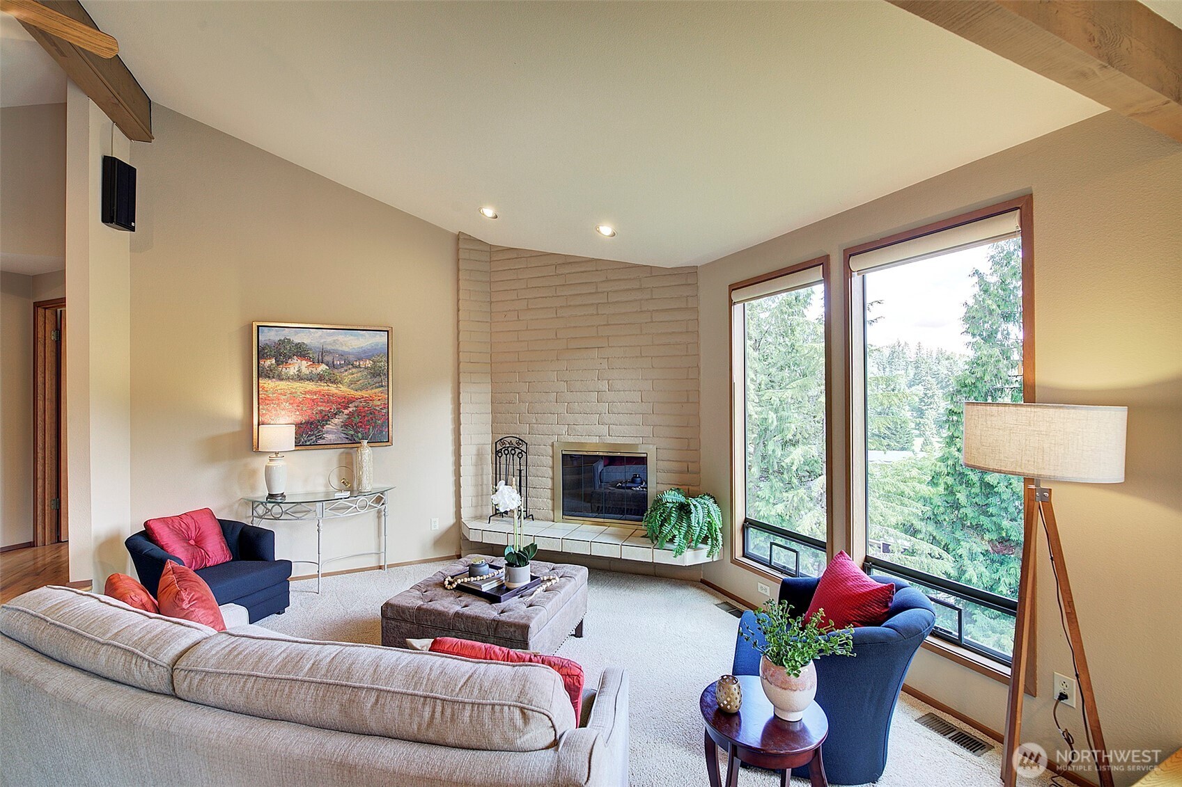 9430 Hoeder Lane Bothell, WA 98011 - Photo 7 of 39 a living room with furniture and a fireplace