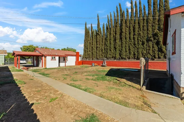 a view of a swimming pool with a lounge chairs