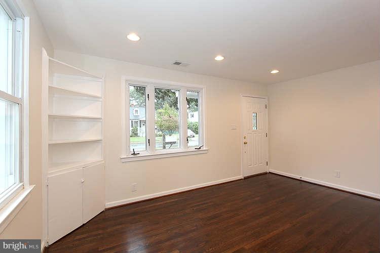 8129 Bullneck Road Baltimore, MD 21222 - Photo 14 of 30 an empty room with wooden floor and window