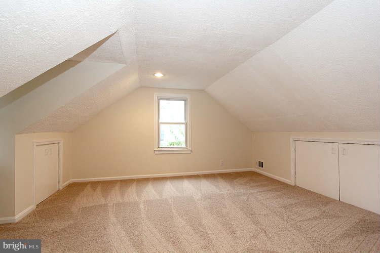 8129 Bullneck Road Baltimore, MD 21222 - Photo 24 of 30 an empty room with a empty space and windows