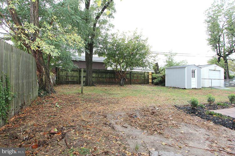 8129 Bullneck Road Baltimore, MD 21222 - Photo 30 of 30 a backyard of a house with lots of green space