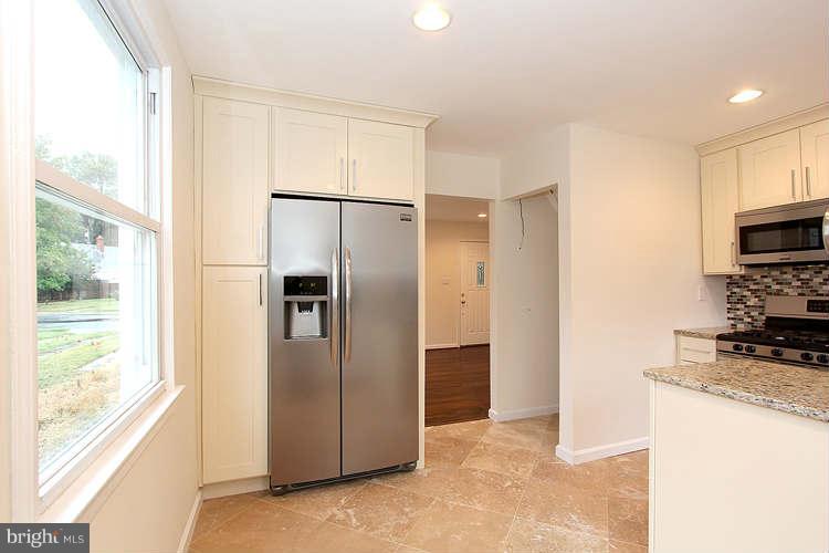 8129 Bullneck Road Baltimore, MD 21222 - Photo 6 of 30 a view of a refrigerator in kitchen and a window