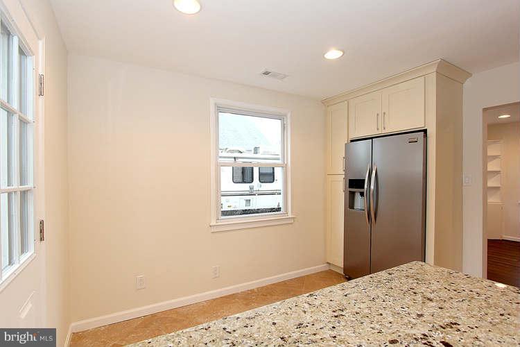 8129 Bullneck Road Baltimore, MD 21222 - Photo 7 of 30 a bedroom with a bed and a window
