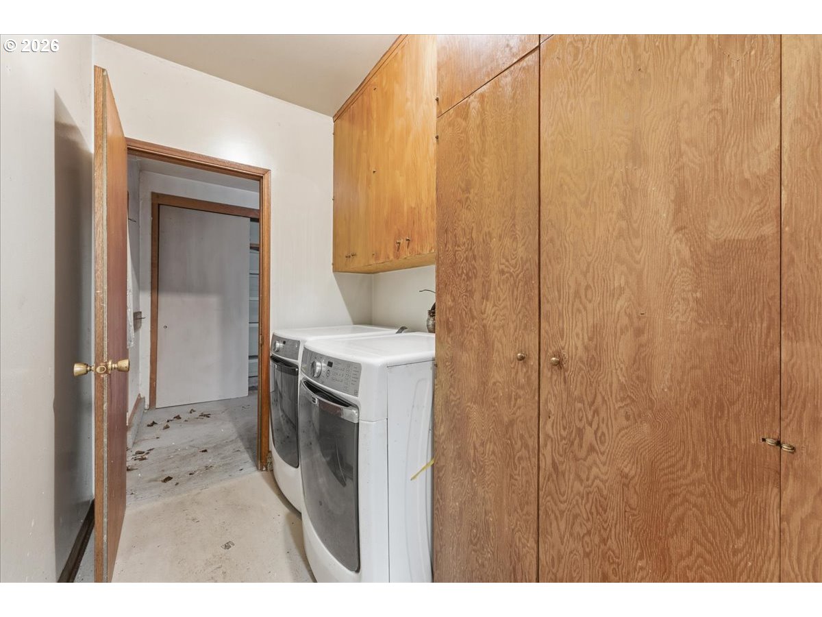 12333 Southeast Madison Street Portland, OR 97233 - Photo 14 of 28 a bathroom with a sink and mirror