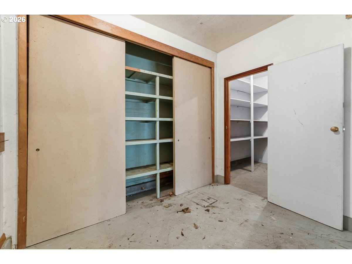 12333 Southeast Madison Street Portland, OR 97233 - Photo 15 of 28 a view of wooden floor and closet in a room
