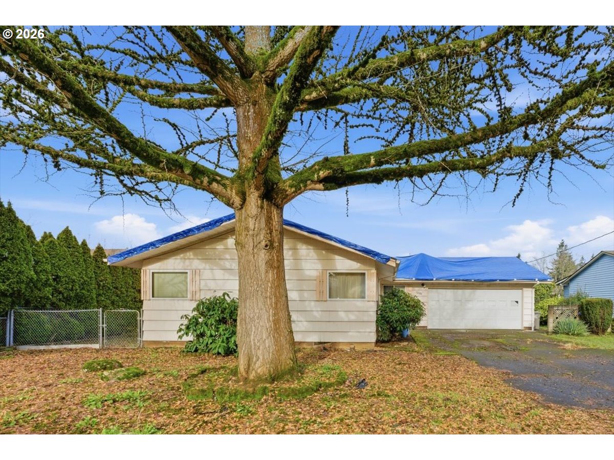 12333 Southeast Madison Street Portland, OR 97233 - Photo 2 of 28 a house view with a garden space