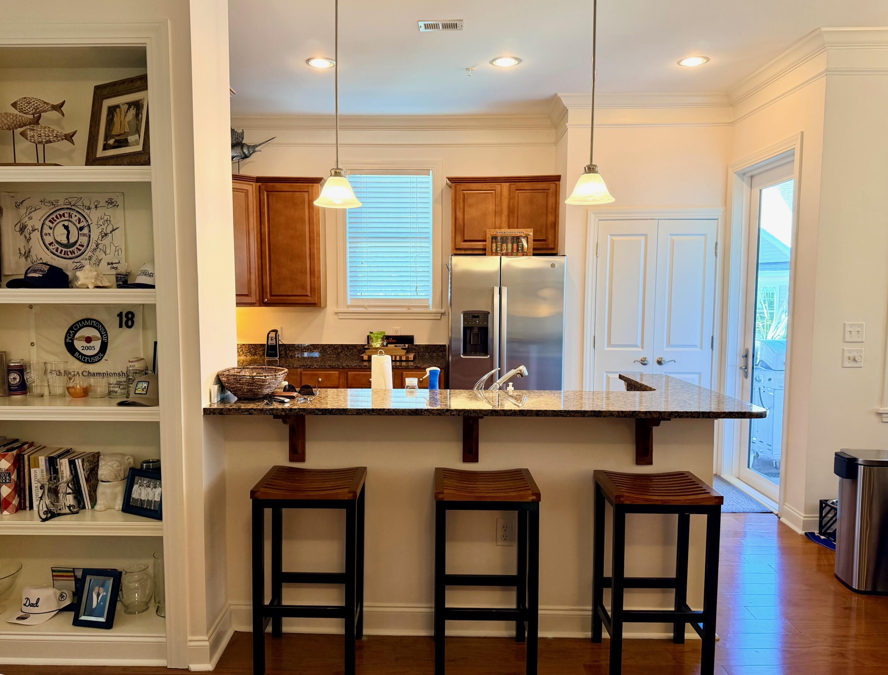 200 River Landing Drive, Unit D202 Daniel Island, SC 29492 - Photo 11 of 47 Island separates living and kitchen