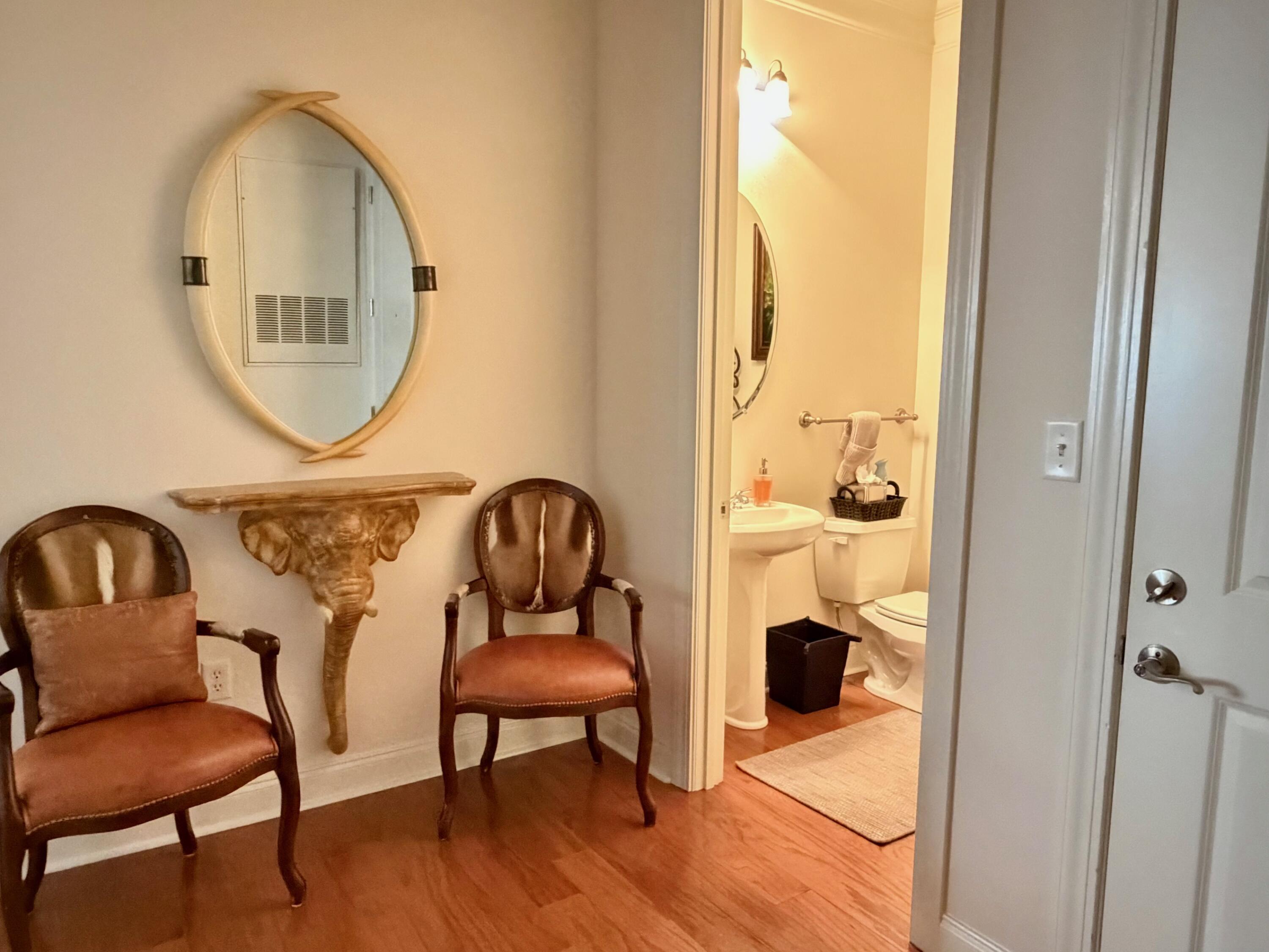 200 River Landing Drive, Unit D202 Daniel Island, SC 29492 - Photo 27 of 47 Half bath near front door off entry