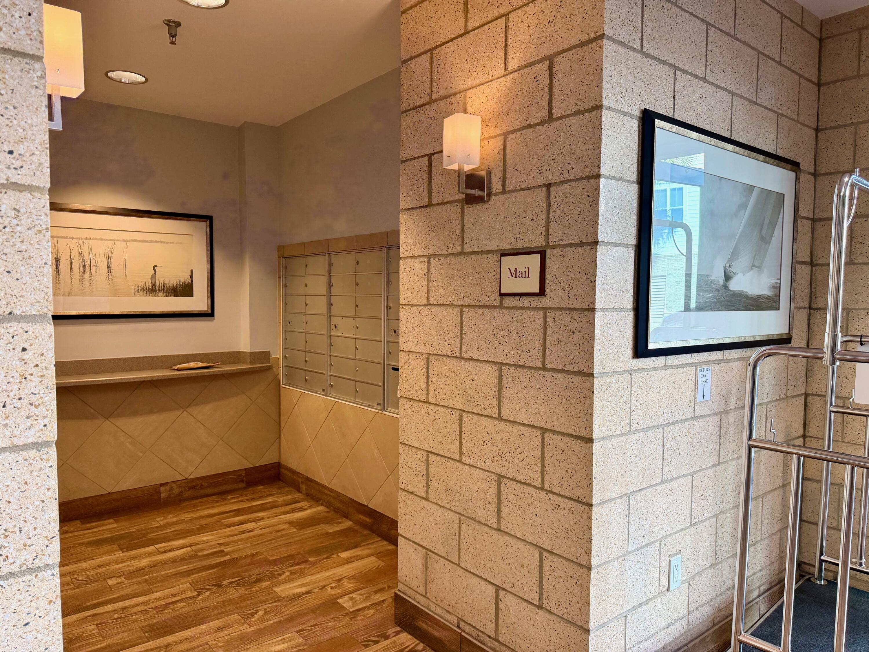 200 River Landing Drive, Unit D202 Daniel Island, SC 29492 - Photo 30 of 47 Postal area in bldg lobby