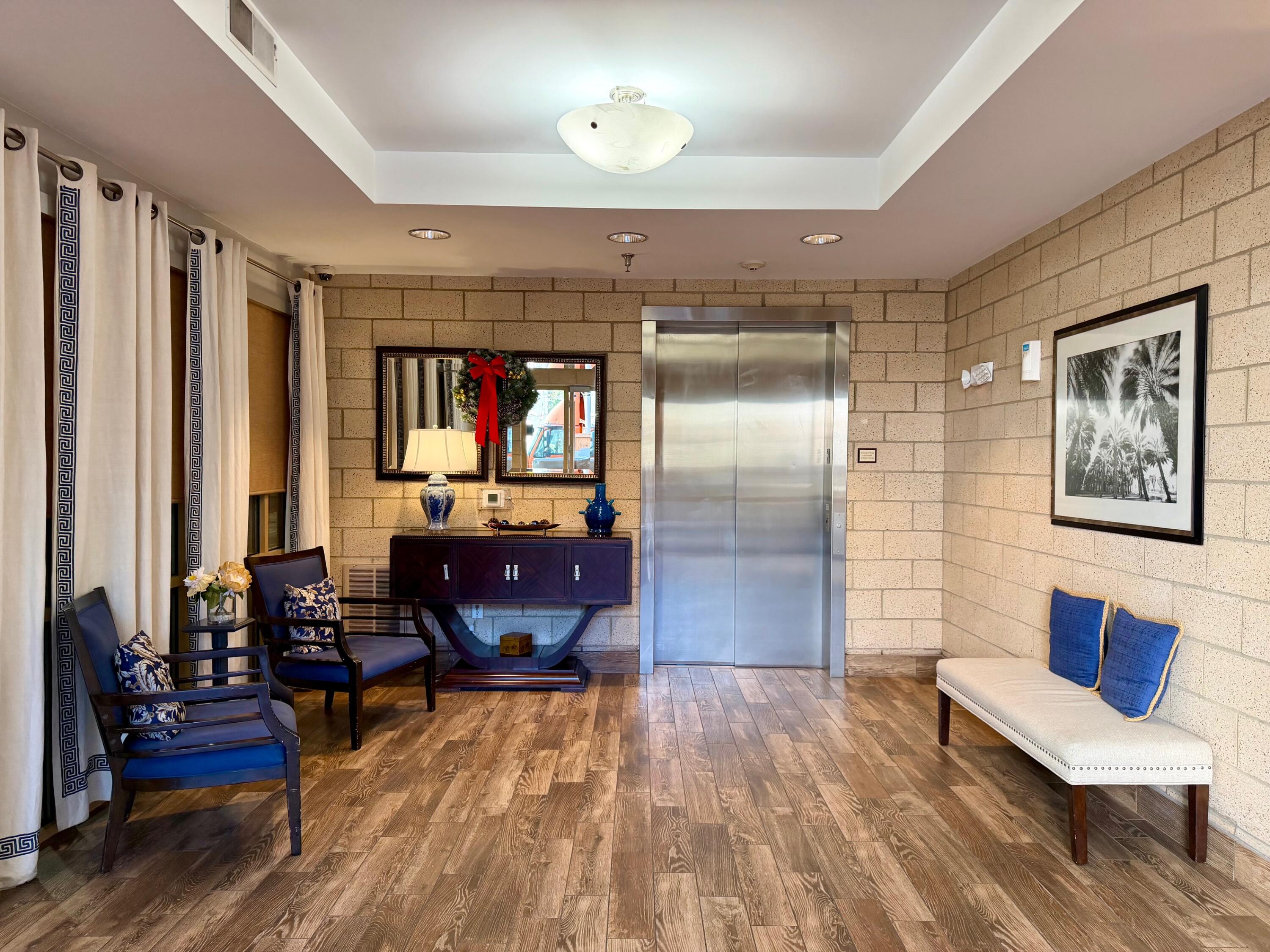 200 River Landing Drive, Unit D202 Daniel Island, SC 29492 - Photo 4 of 47 Entry - elevators and access to garage