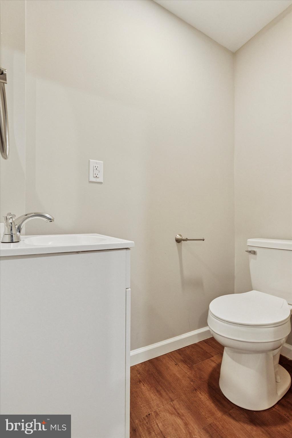 232 Main Street Hellertown, PA 18055 - Photo 12 of 13 a bathroom with a toilet and a sink