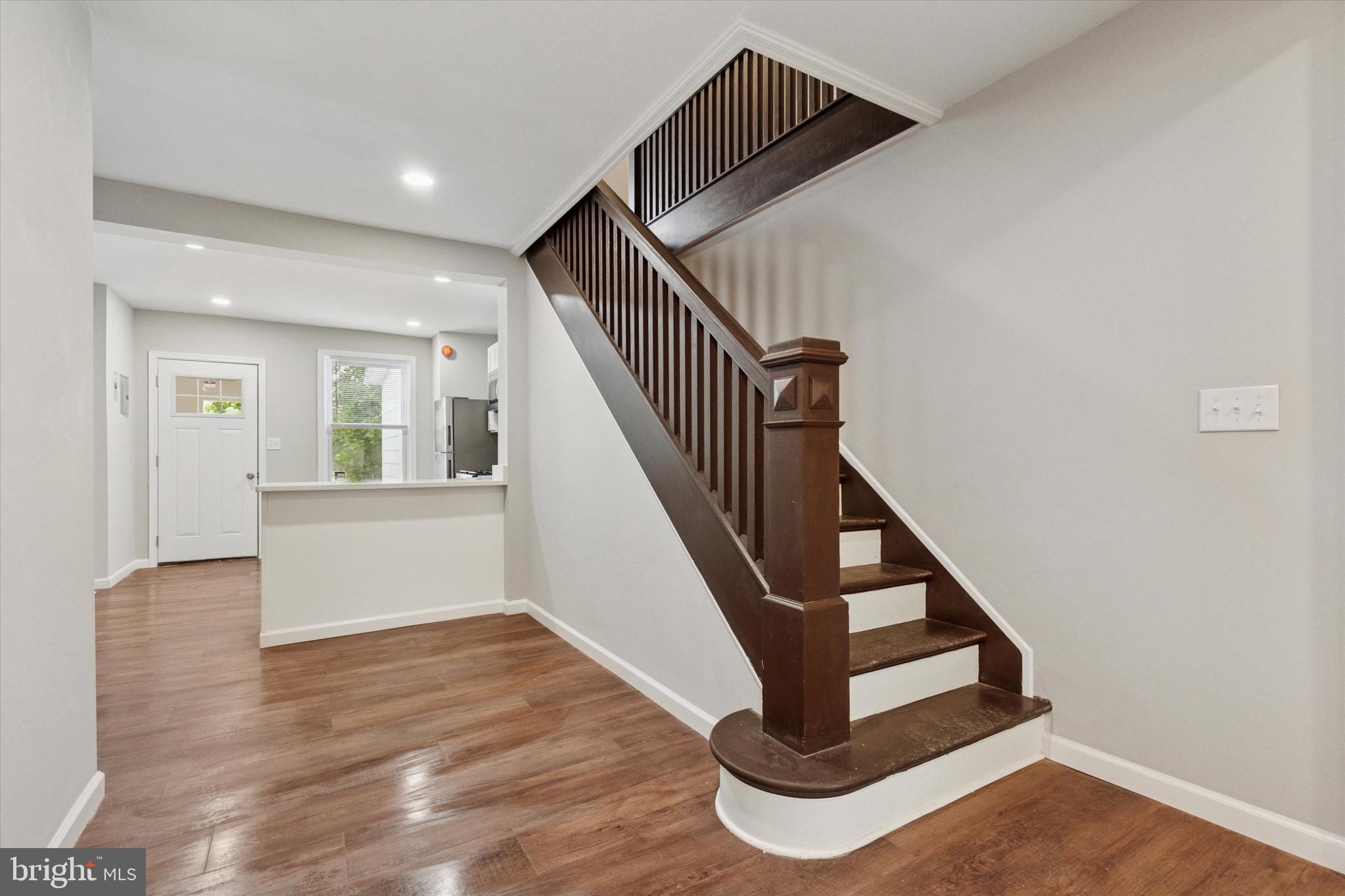 232 Main Street Hellertown, PA 18055 - Photo 5 of 13 a view of entryway and hall with wooden floor