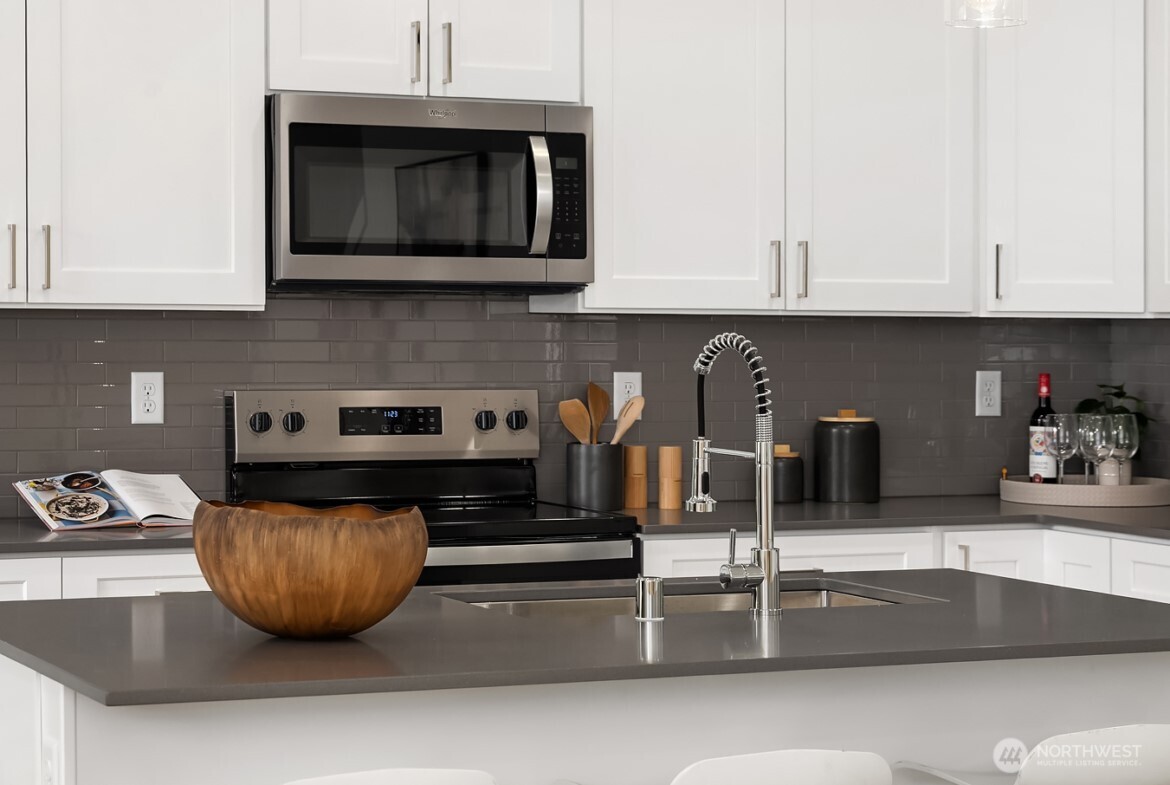 5822 Lowell Larimer Road Everett, WA 98208 - Photo 7 of 36 a kitchen with a sink and cabinets