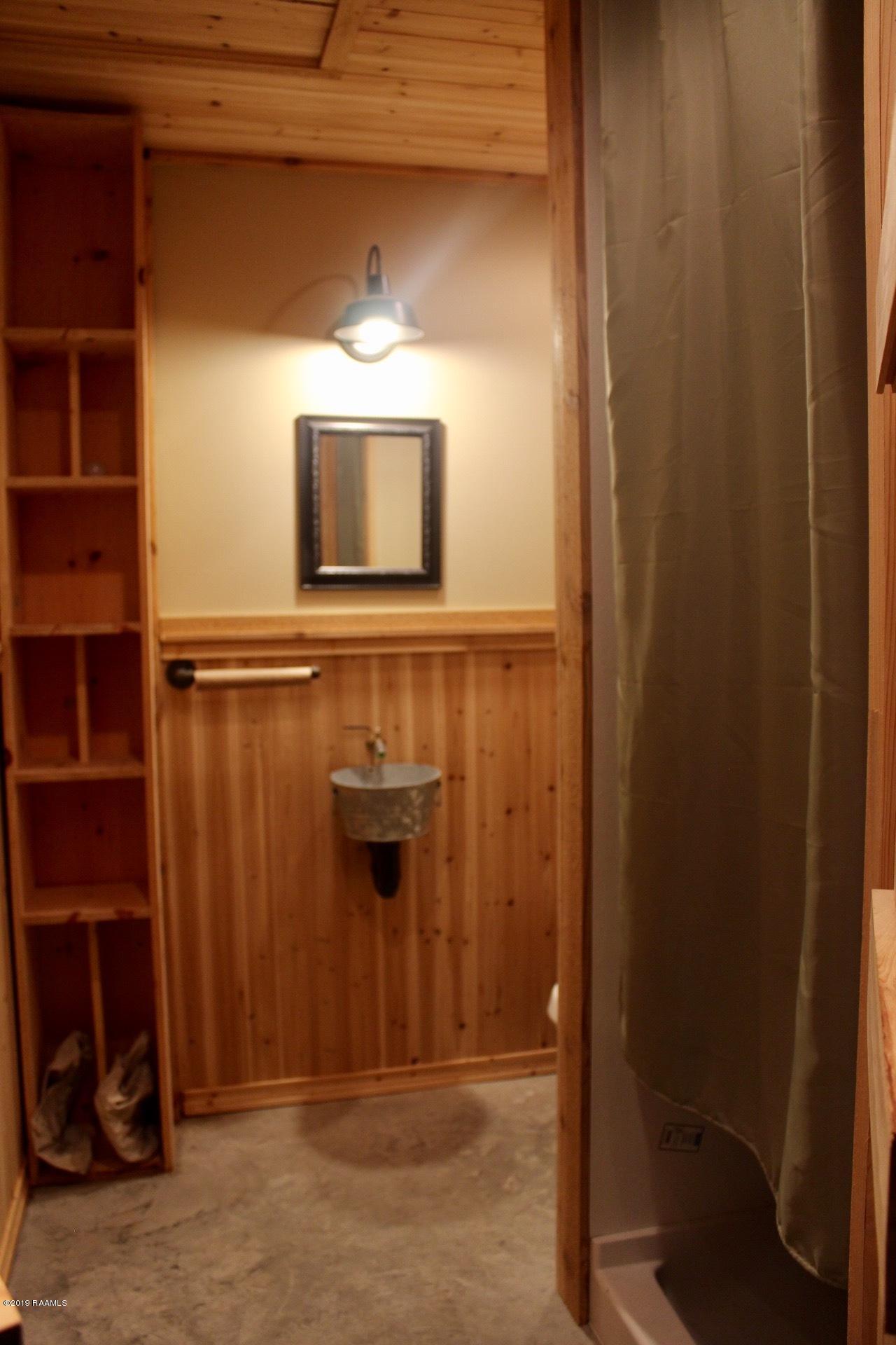 216 Brady Road Port Barre, LA 70577 - Photo 15 of 20 3RD FULL BATH IN ENTERTAINING AREA