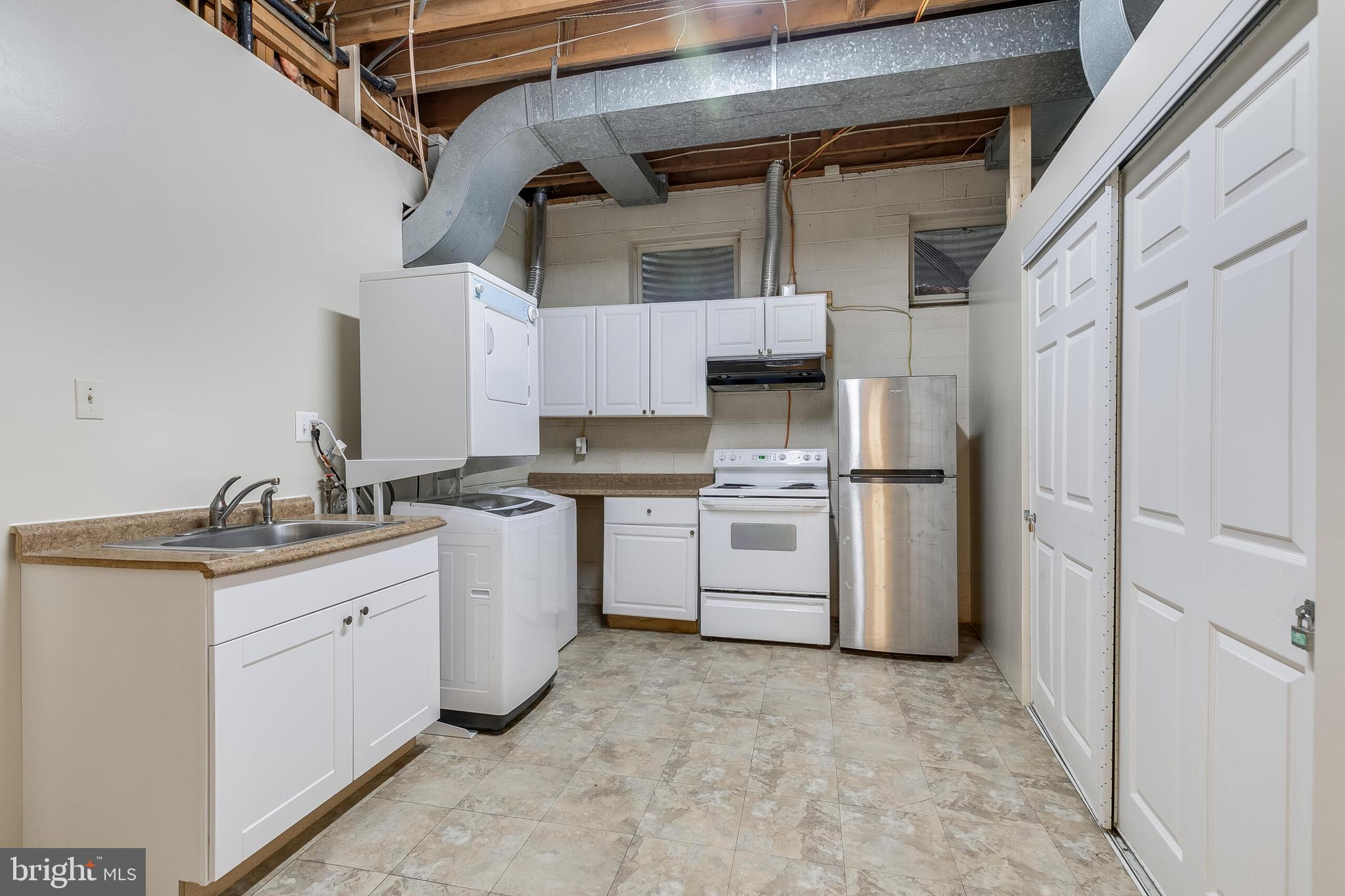 4054 North 41st Street McLean, VA 22101 - Photo 44 of 45 Lower level kitchenette and laundry