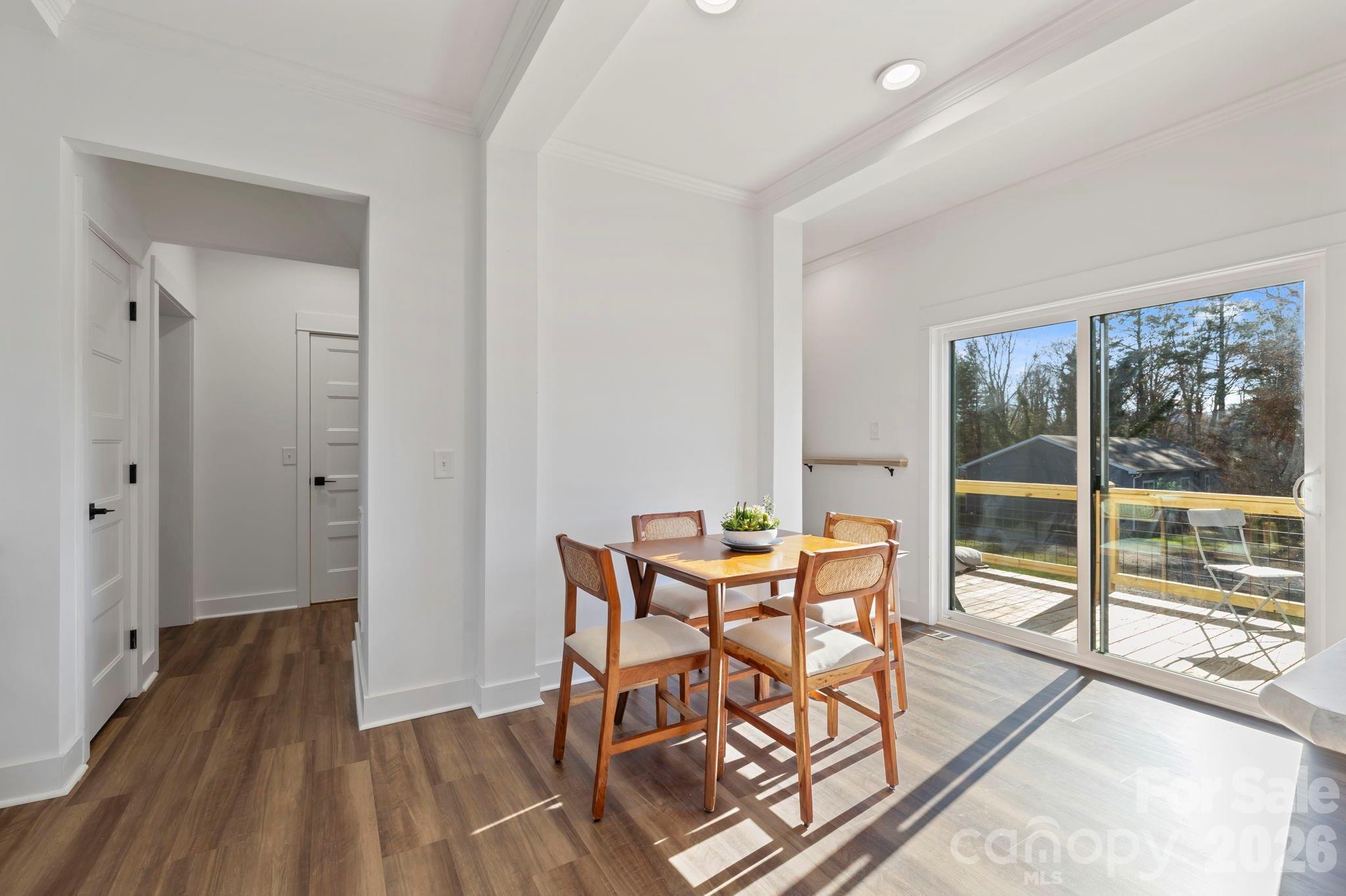 205 Southern Charm Road Arden, NC 28704 - Photo 12 of 34 a view of a room with furniture and wooden floor
