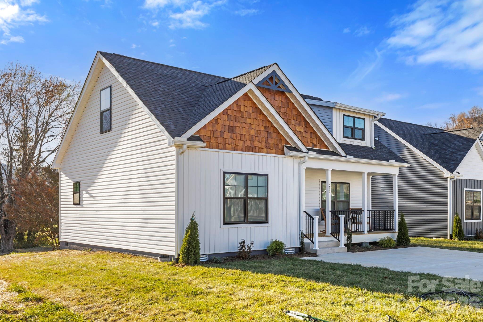 205 Southern Charm Road Arden, NC 28704 - Photo 2 of 34 a front view of house with yard