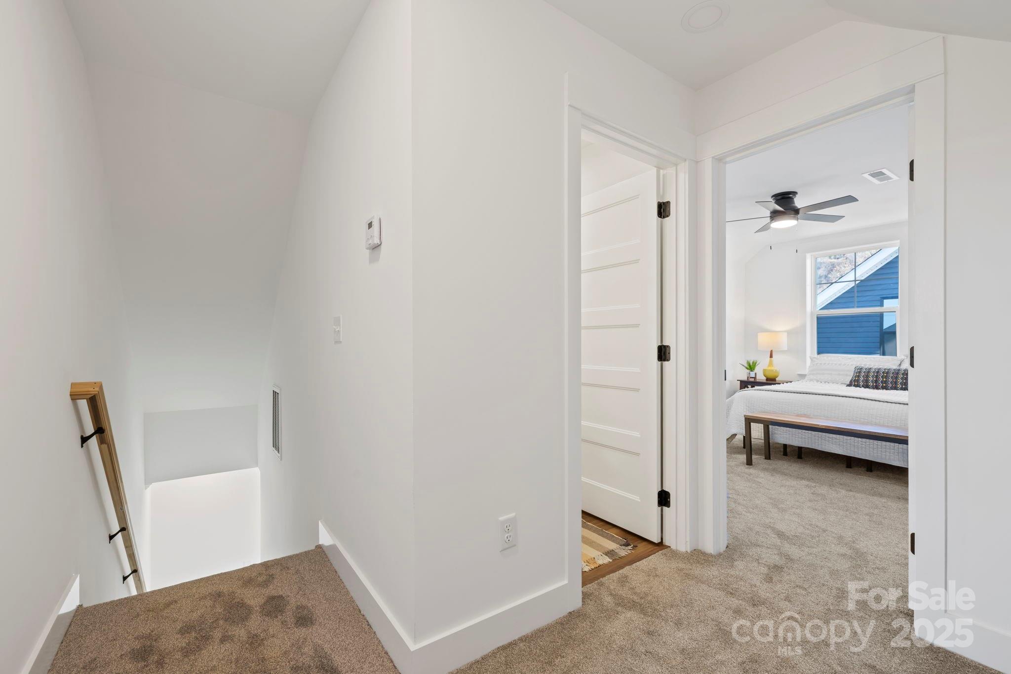 205 Southern Charm Road Arden, NC 28704 - Photo 22 of 26 a view of a bedroom with tub and shower