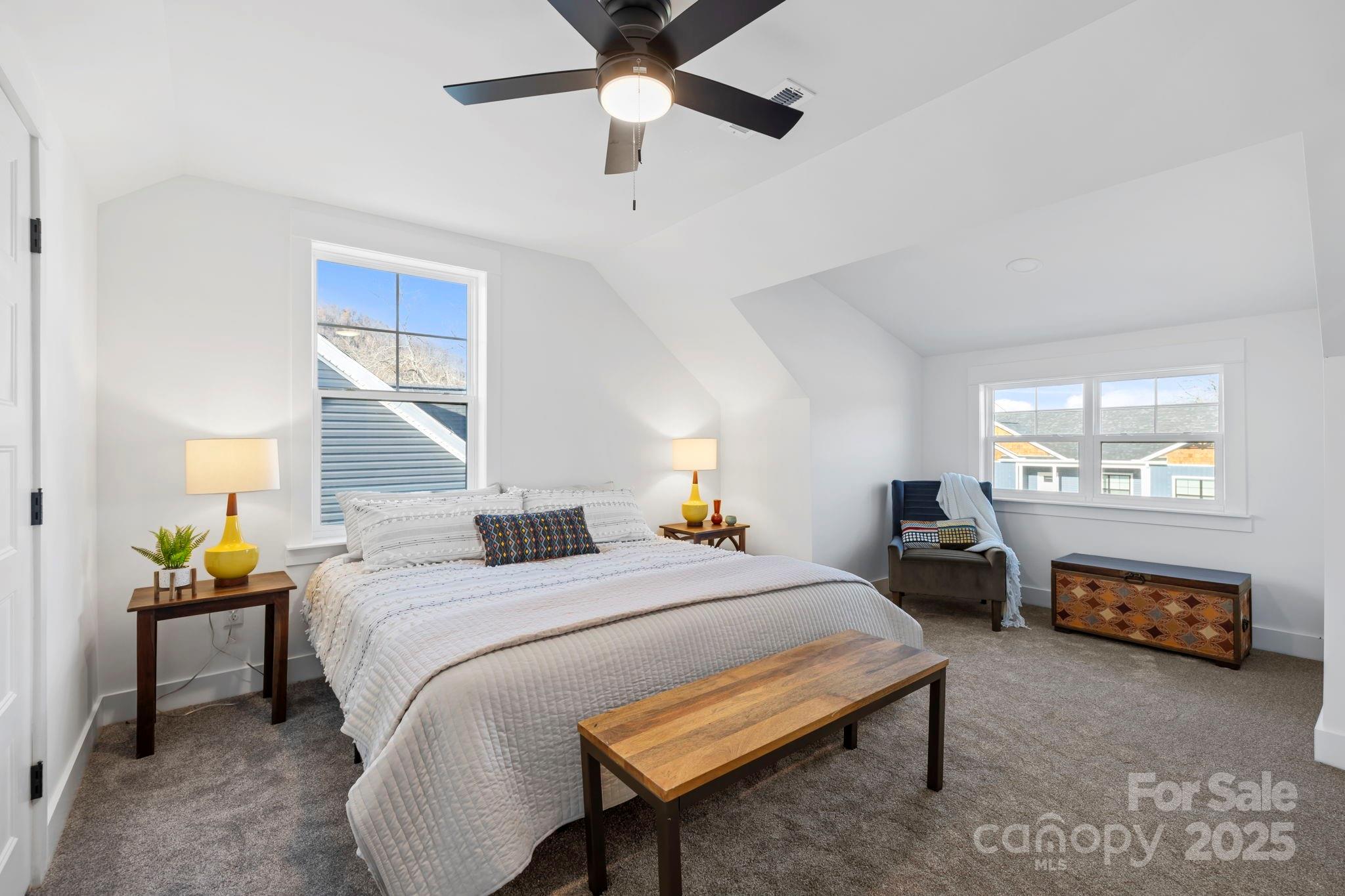 205 Southern Charm Road Arden, NC 28704 - Photo 25 of 26 a bedroom with a bed and a window